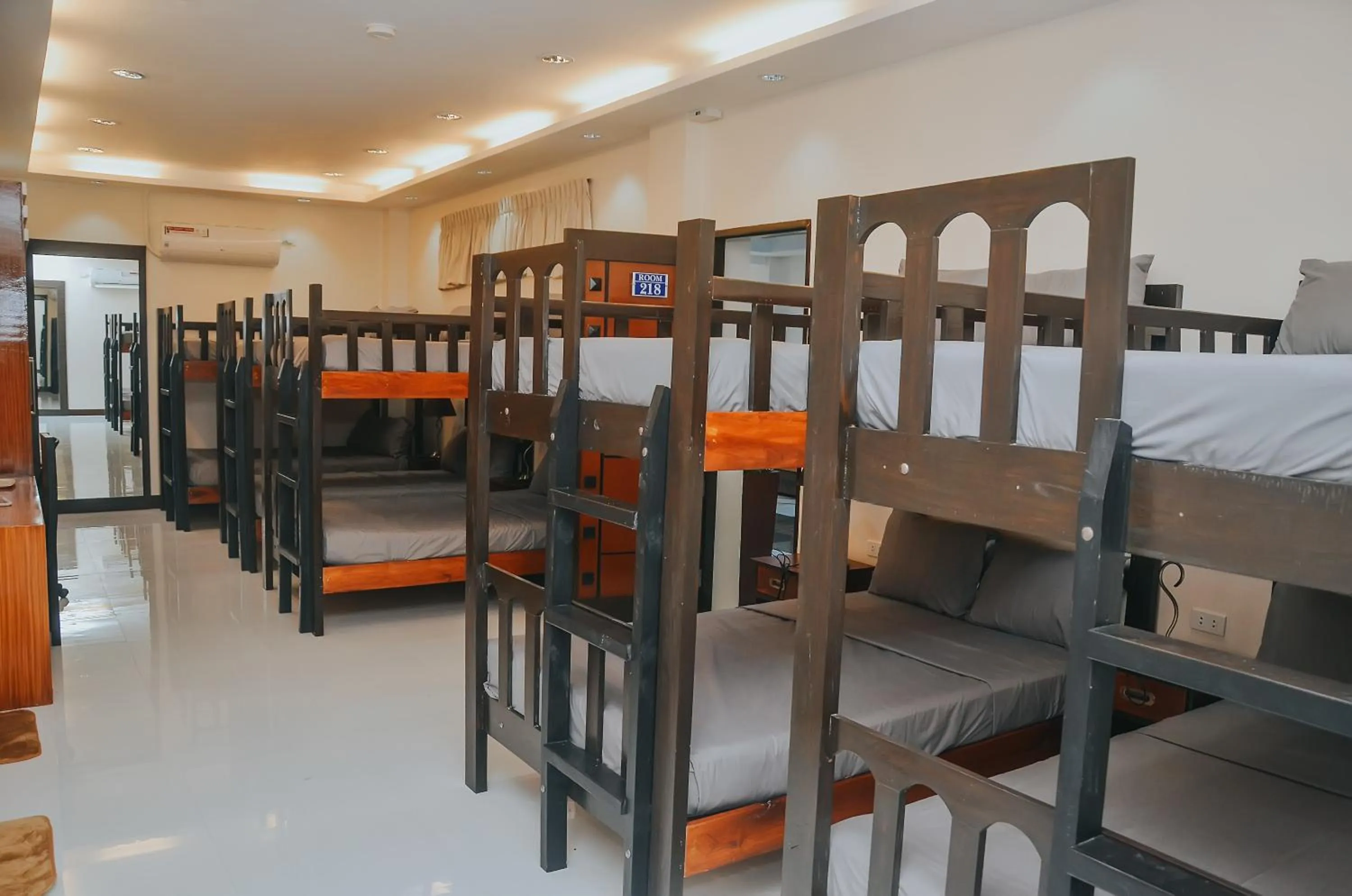 Bed in Villa MJ Maristela Beach Resort