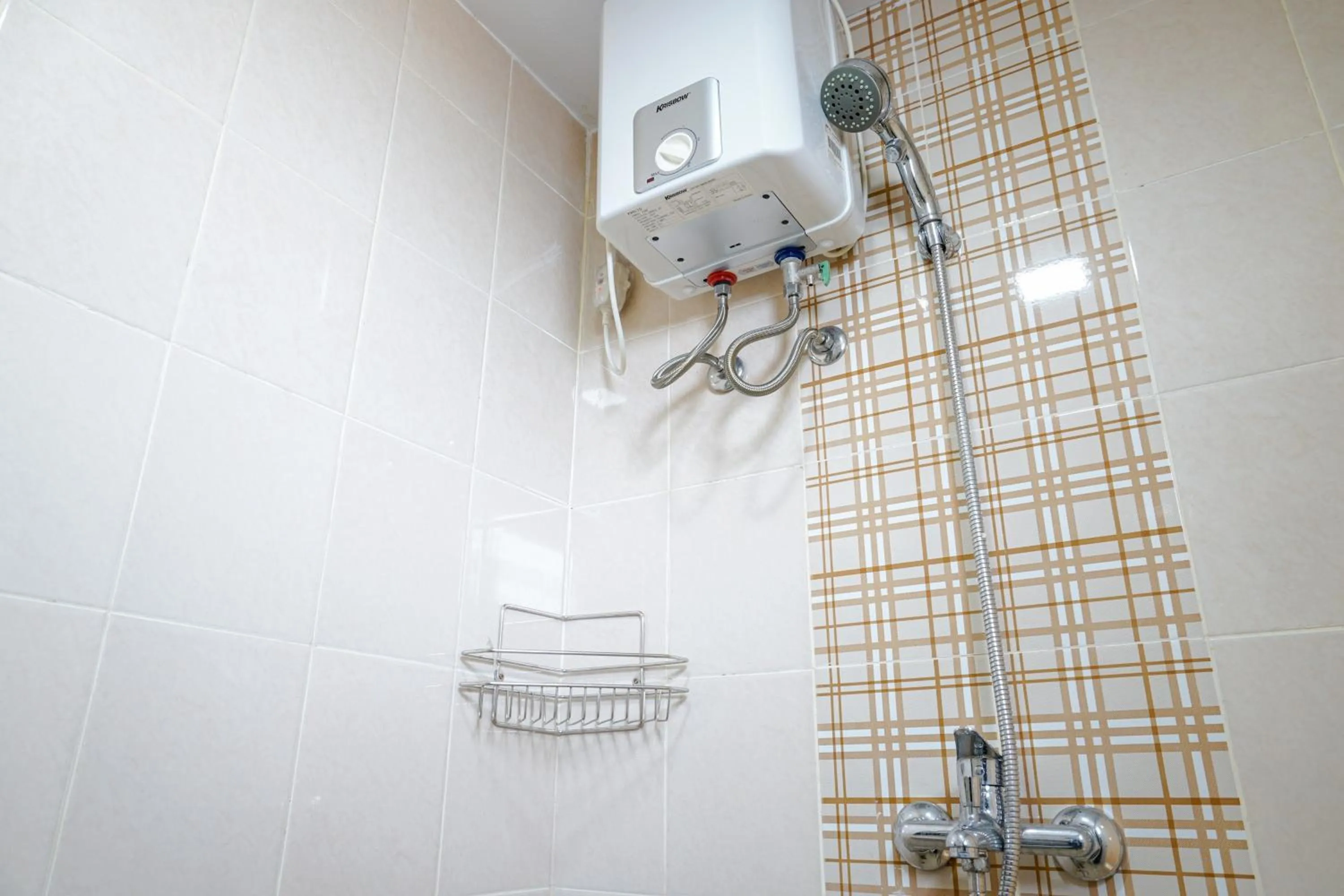 Comfortable 3BR Apartment at Green Palm Residences By Travelio