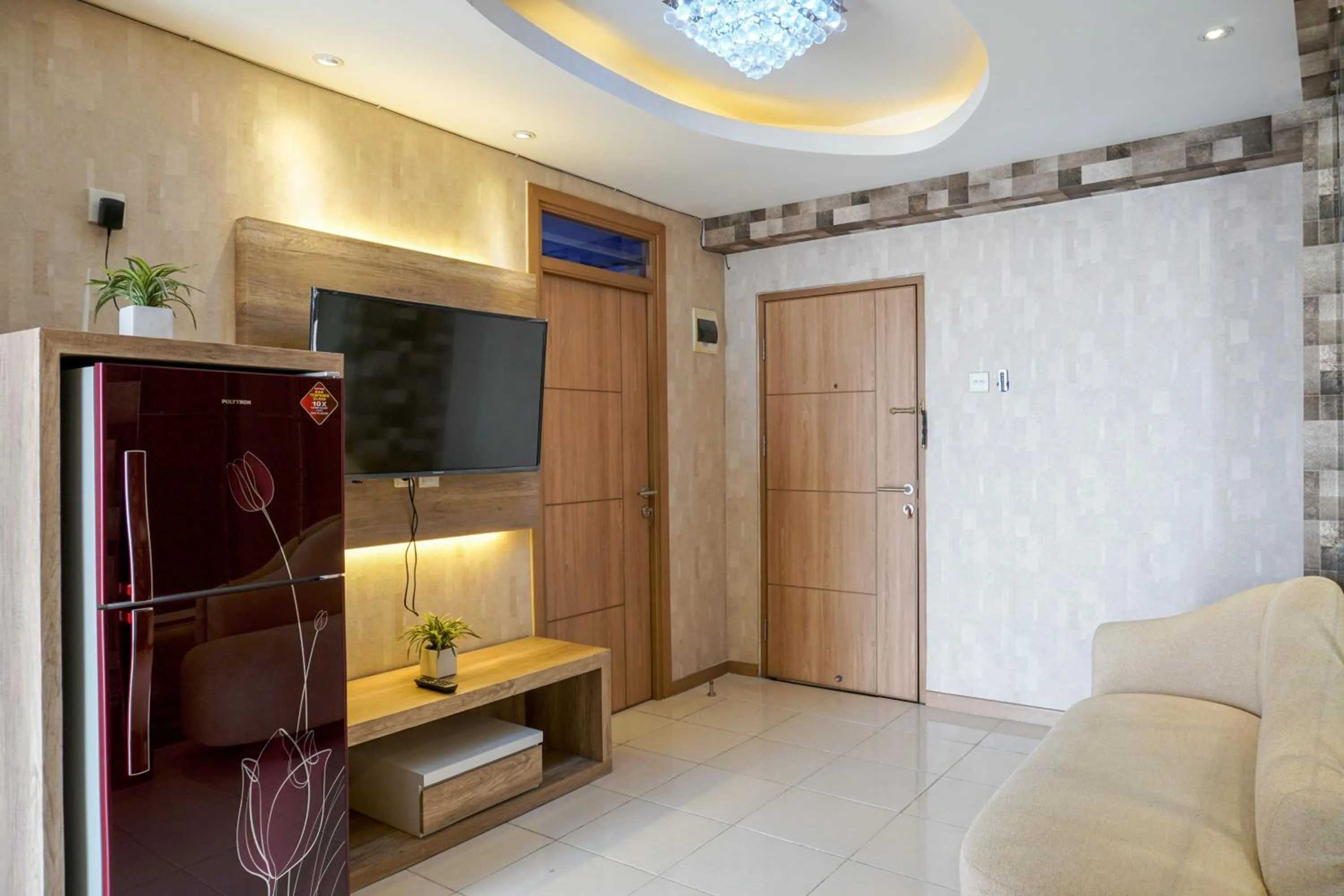 Comfortable 3BR Apartment at Green Palm Residences By Travelio