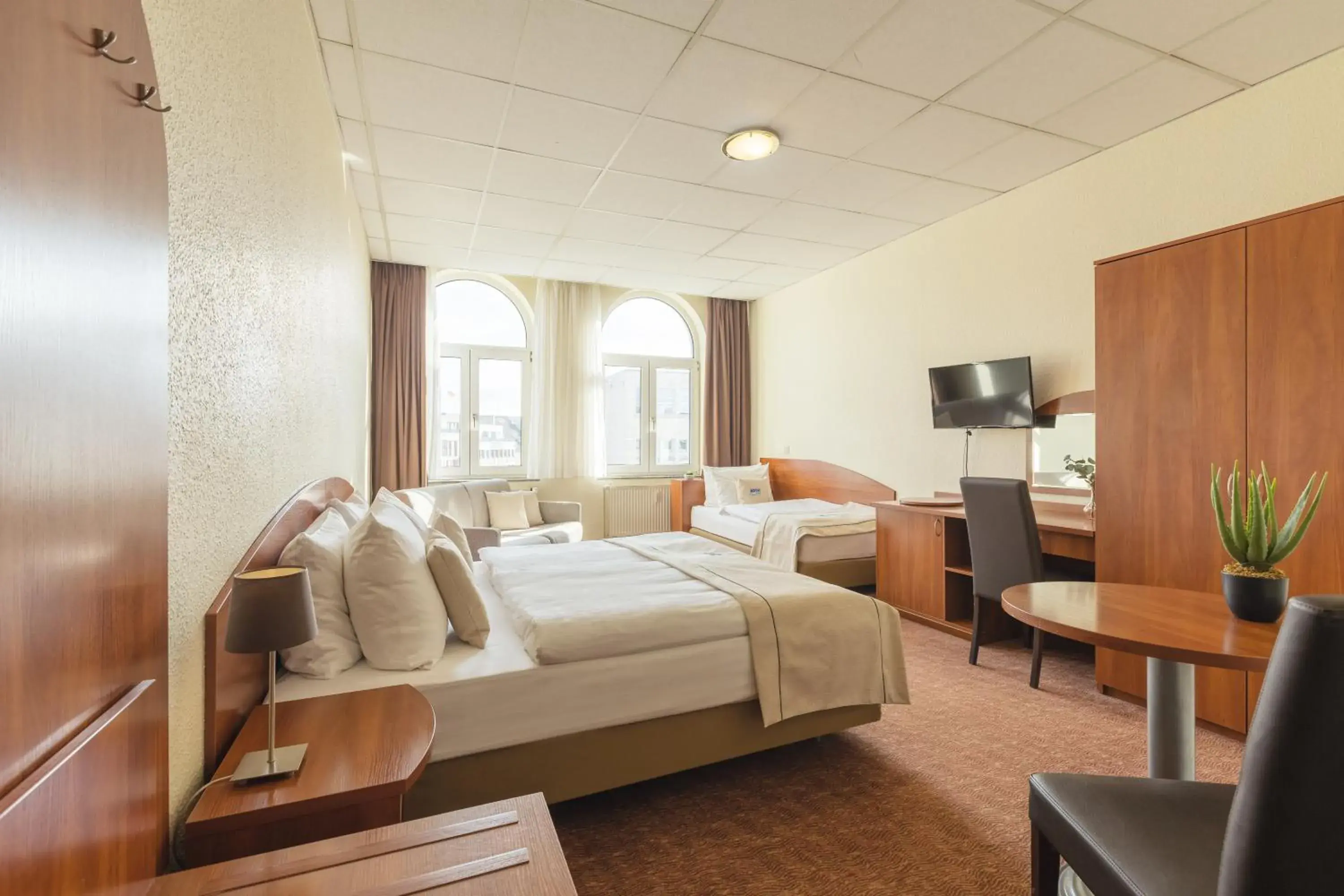 Comfort Quadruple Room in Hotel Hamburg Stadtzentrum Comfort Quadruple Room in Hotel Hamburg Stadtzentrum