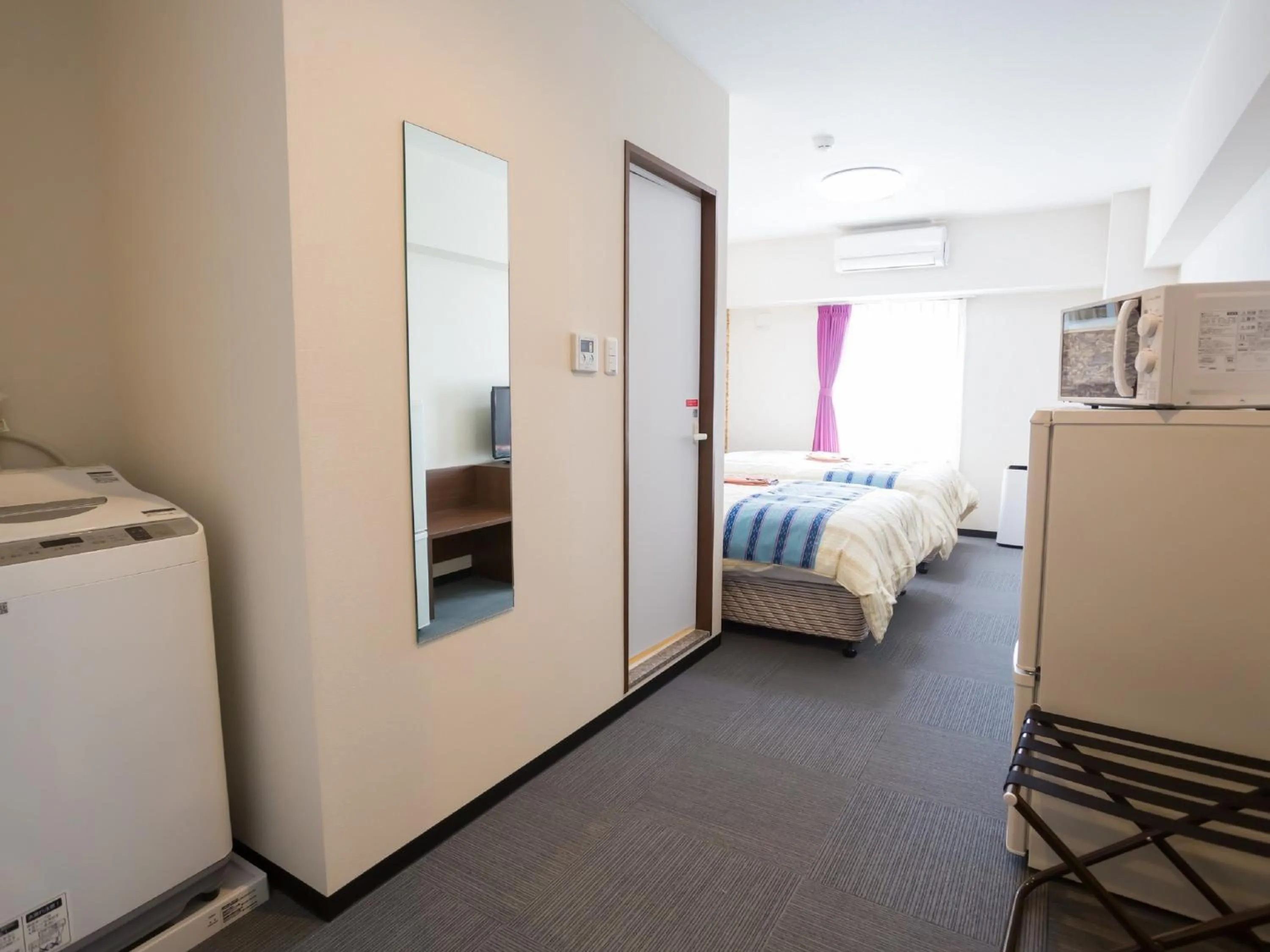 Bed in Hotel Peace Island Nago