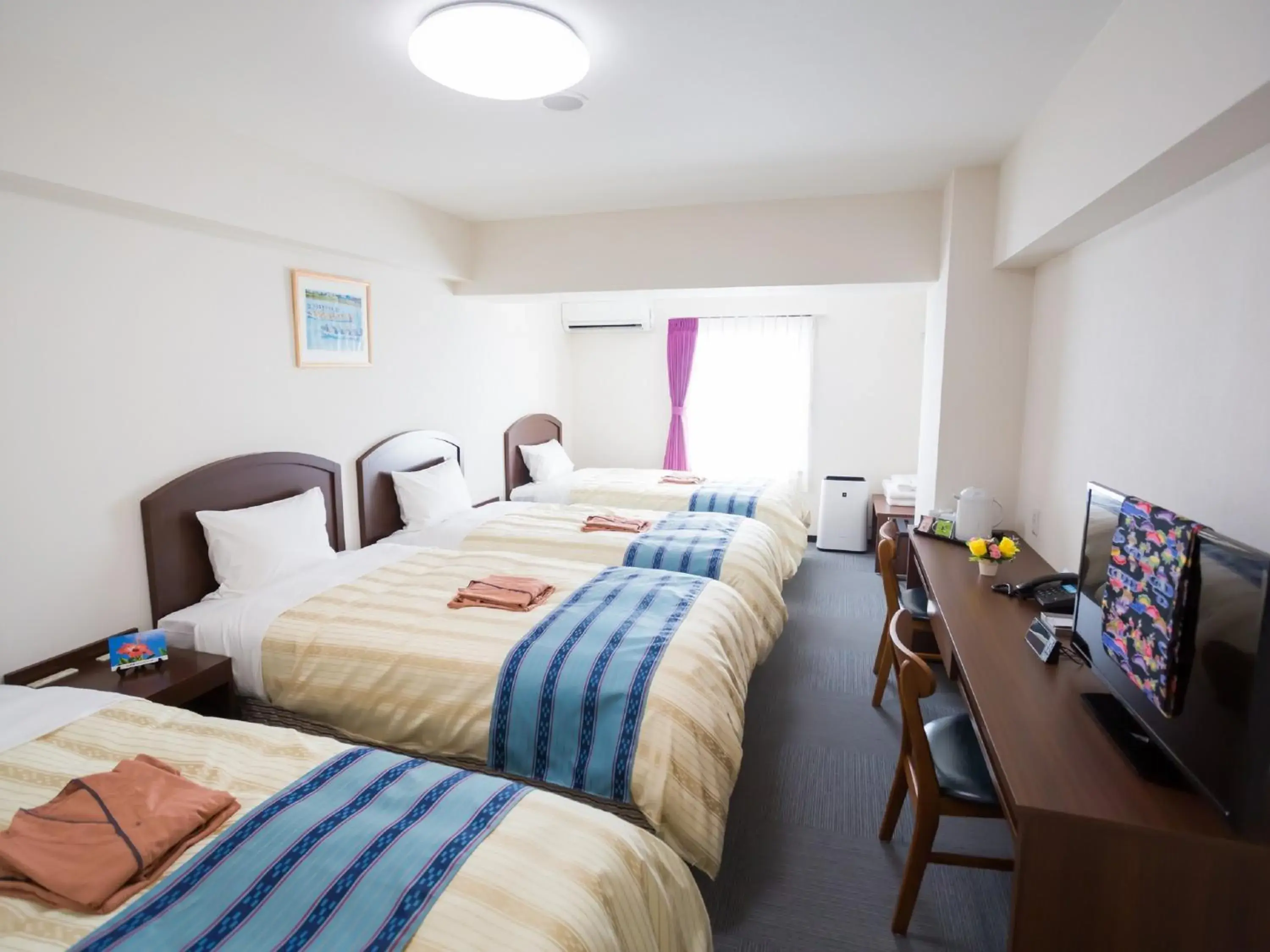 Quadruple Room in Hotel Peace Island Nago Quadruple Room in Hotel Peace Island Nago