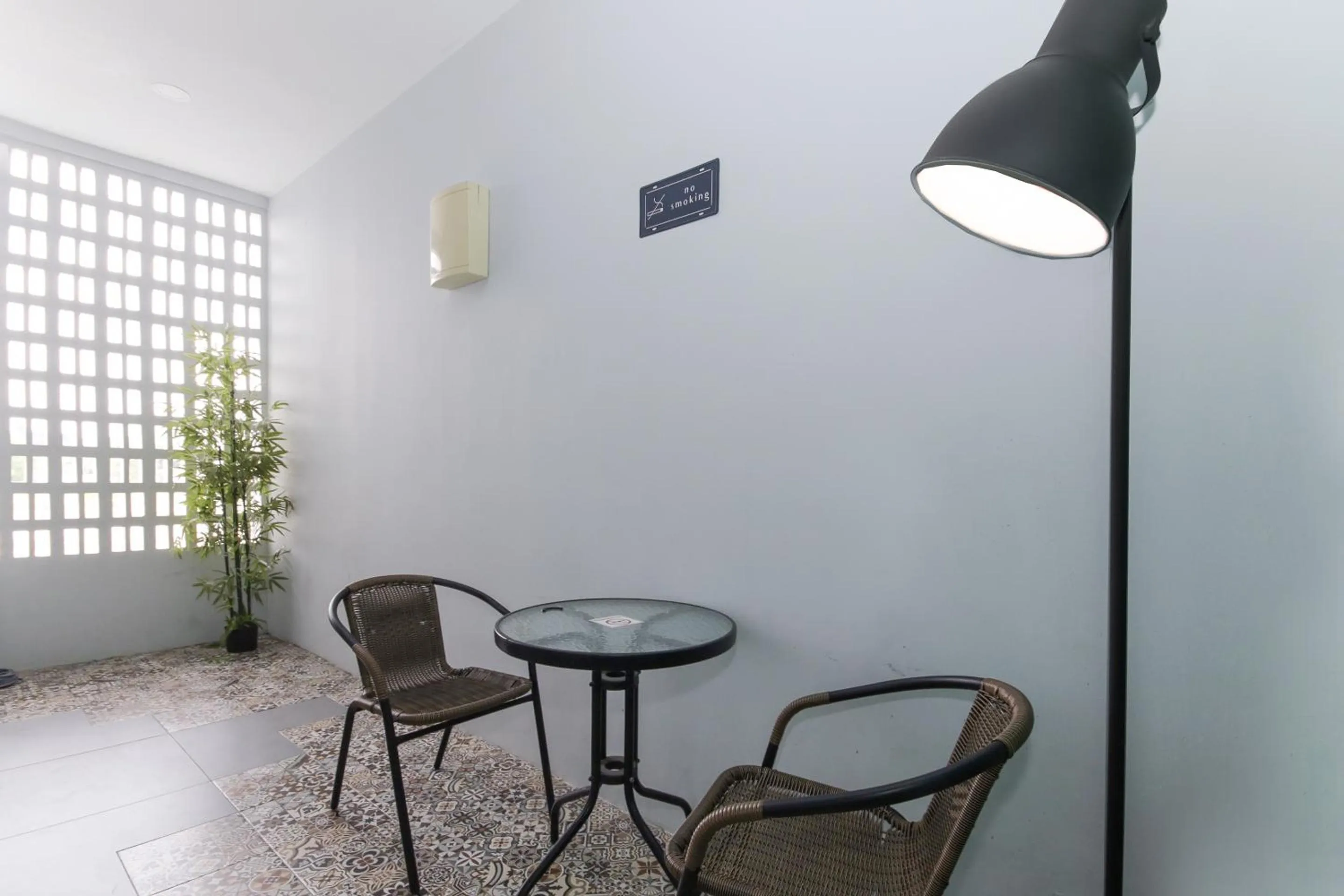 Seating area in OYO 90399 Green Home Hotel syariah