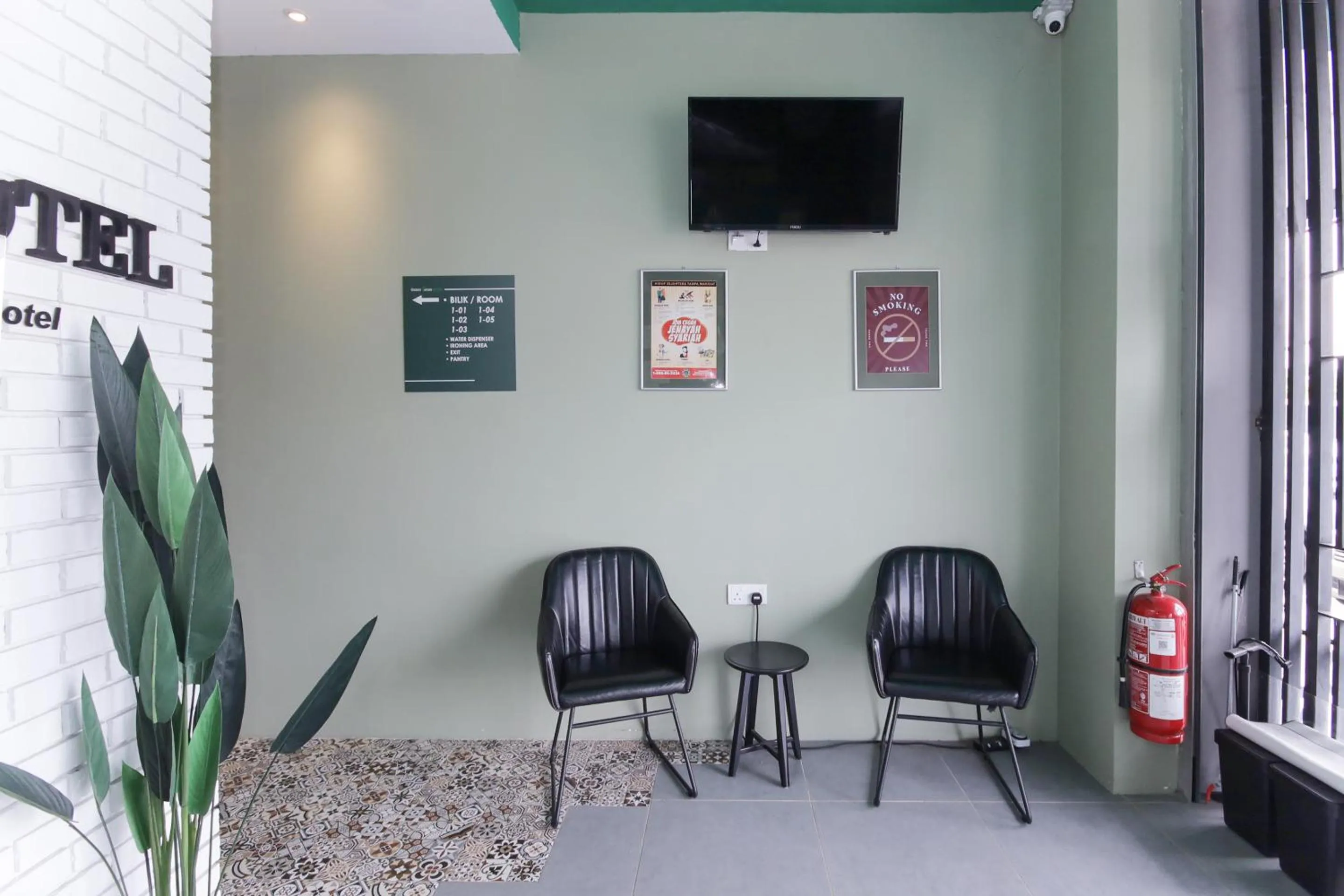 Lobby or reception in OYO 90399 Green Home Hotel syariah