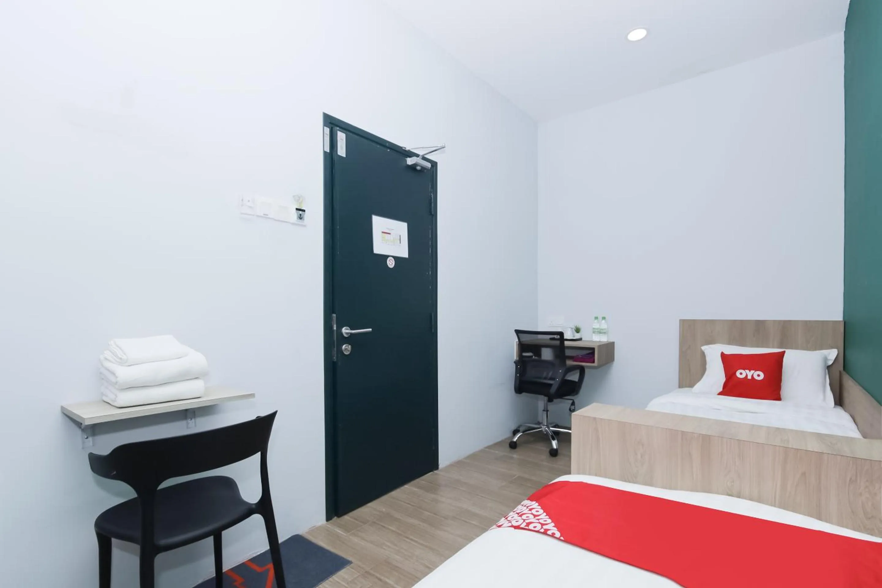 Bedroom in OYO 90399 Green Home Hotel syariah