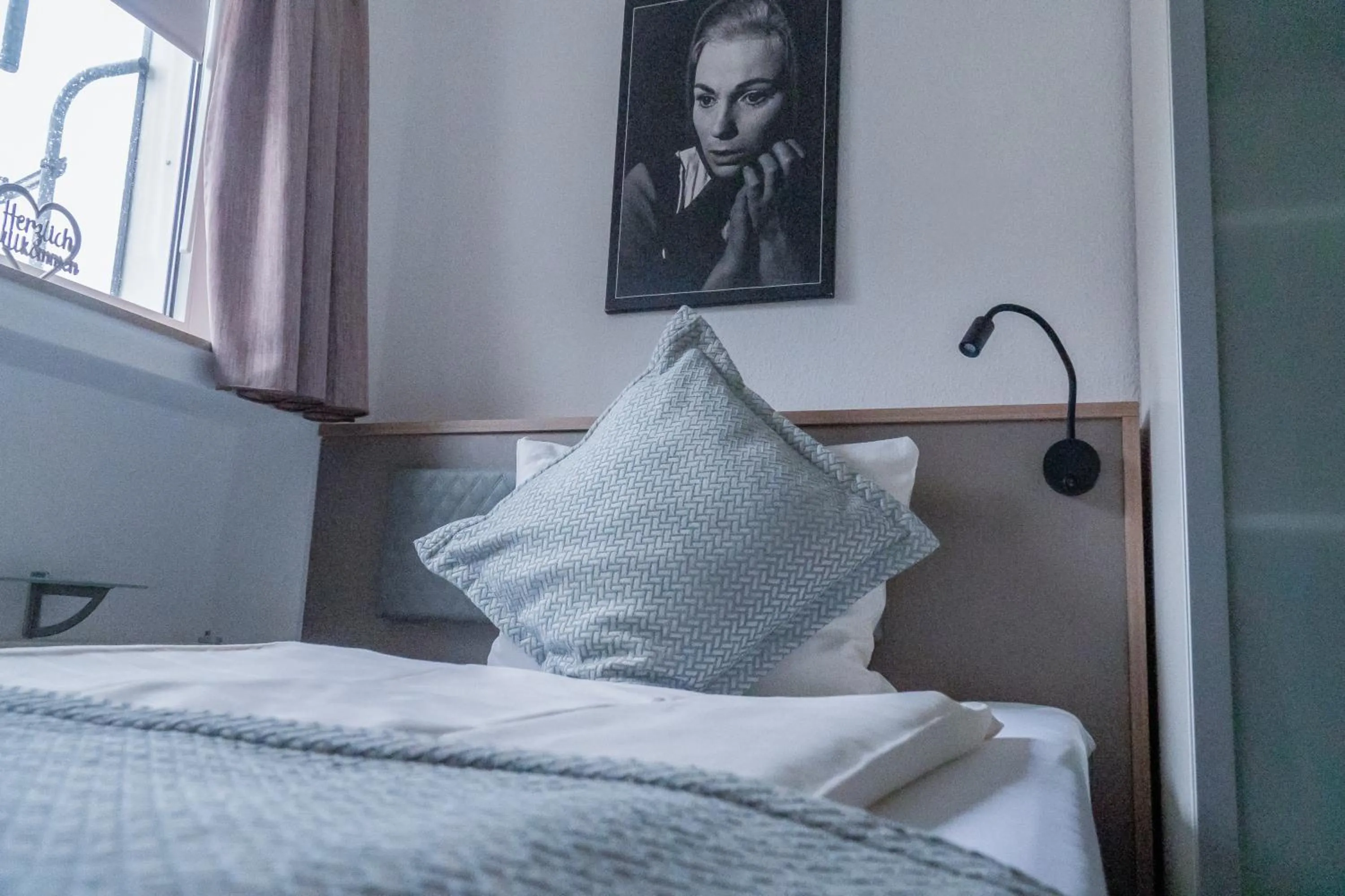 Bed in Stadt-gut-Hotel Rheinischer Hof