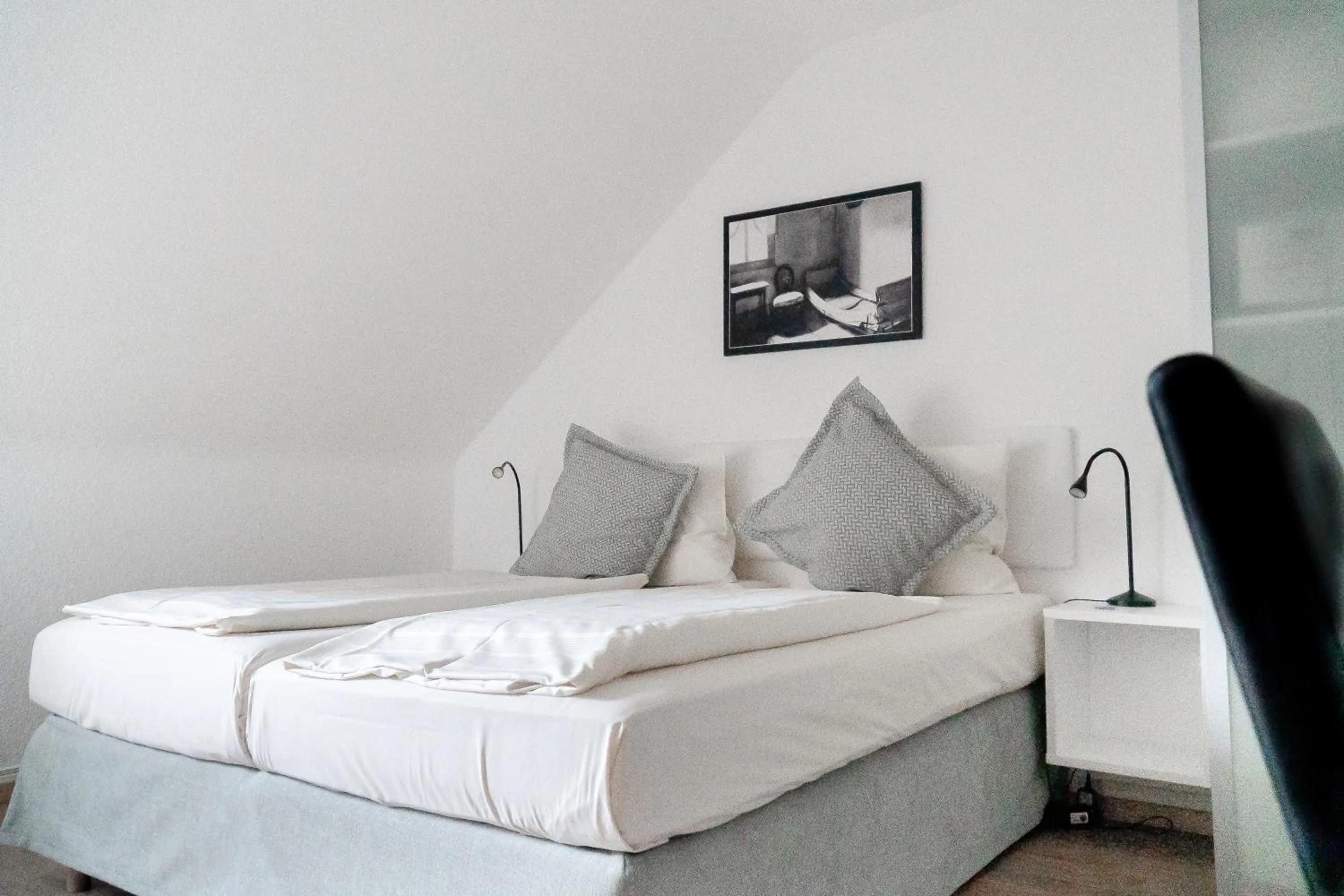 Bed in Stadt-gut-Hotel Rheinischer Hof