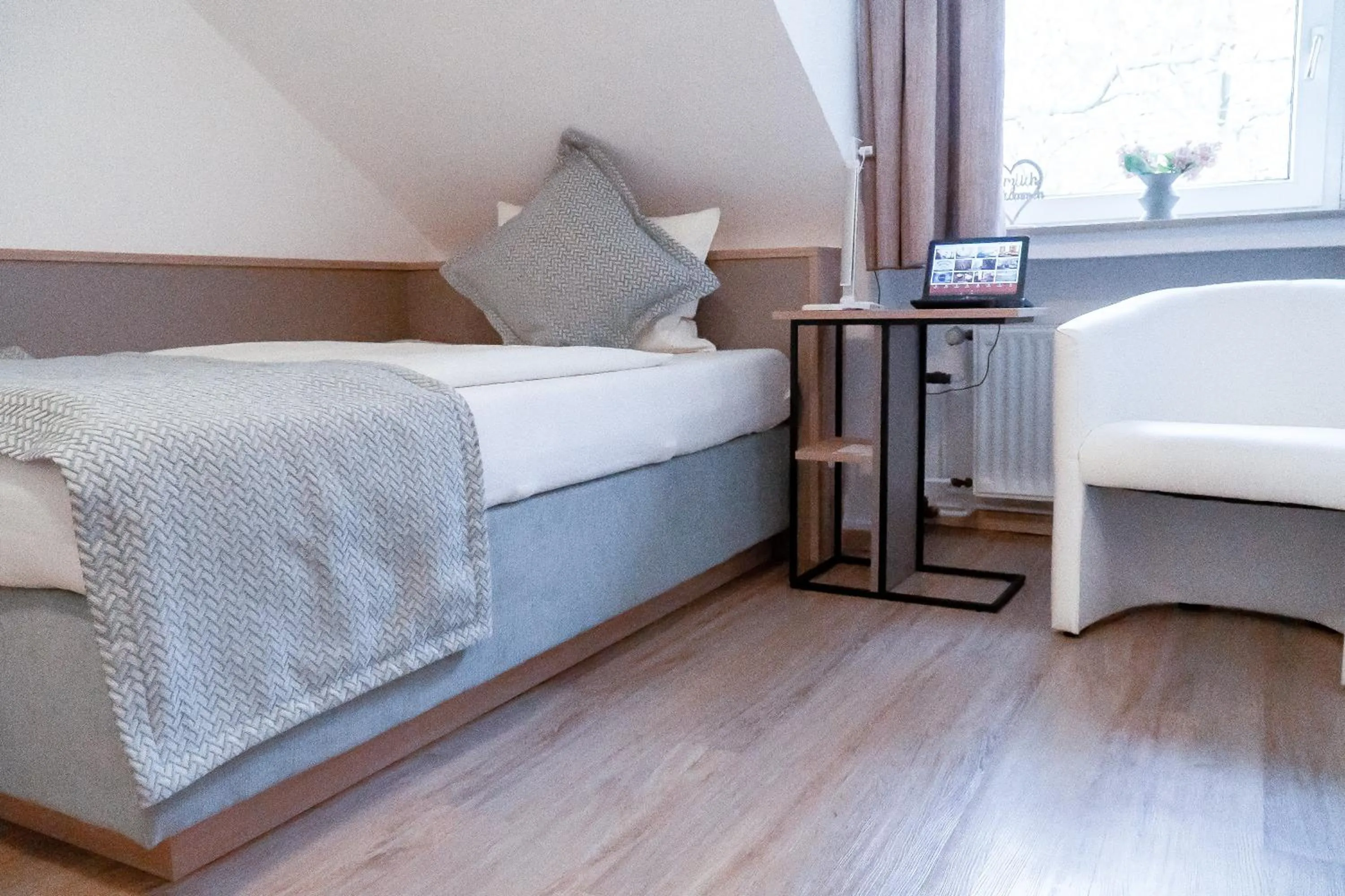 Bed in Stadt-gut-Hotel Rheinischer Hof