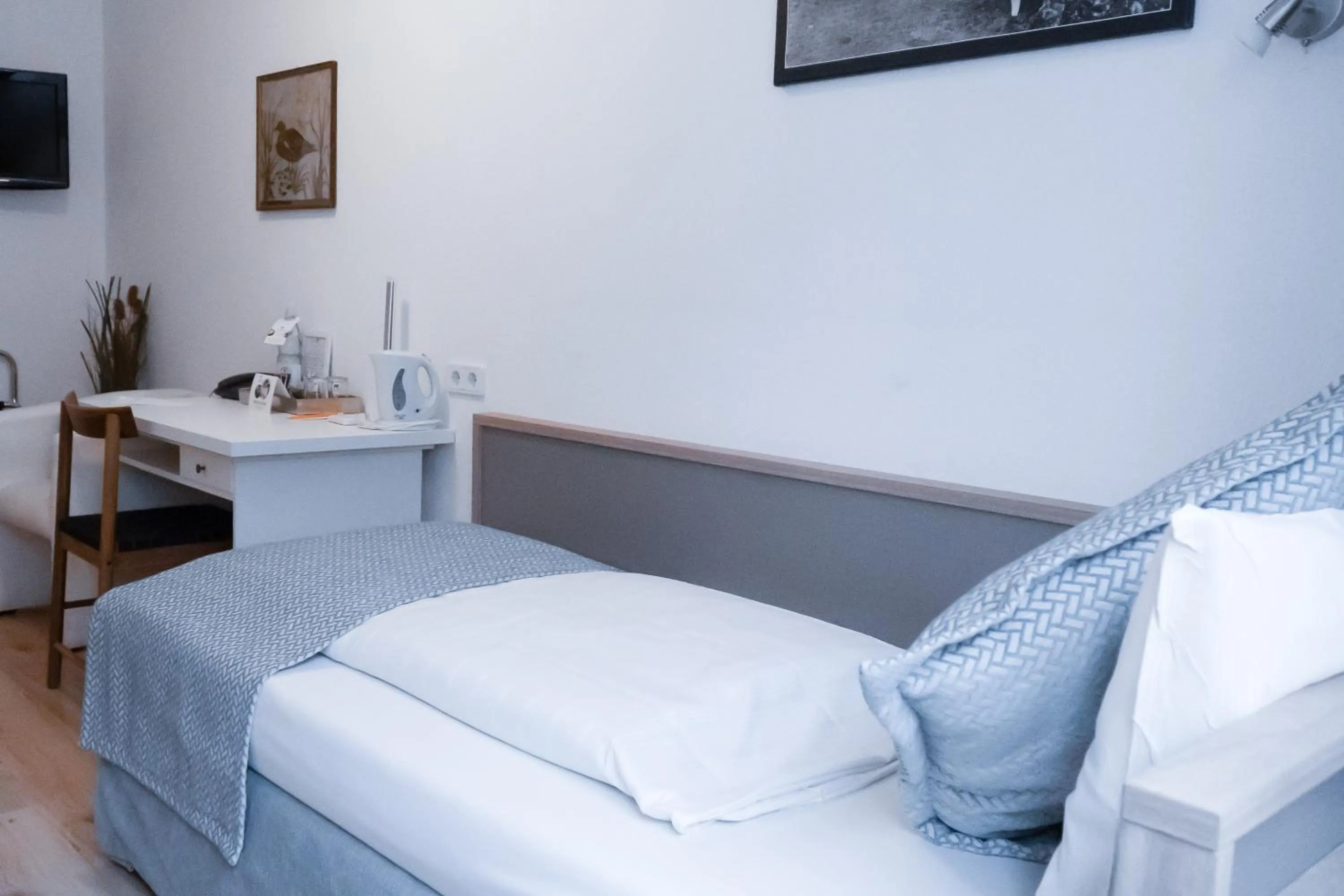 Bed in Stadt-gut-Hotel Rheinischer Hof