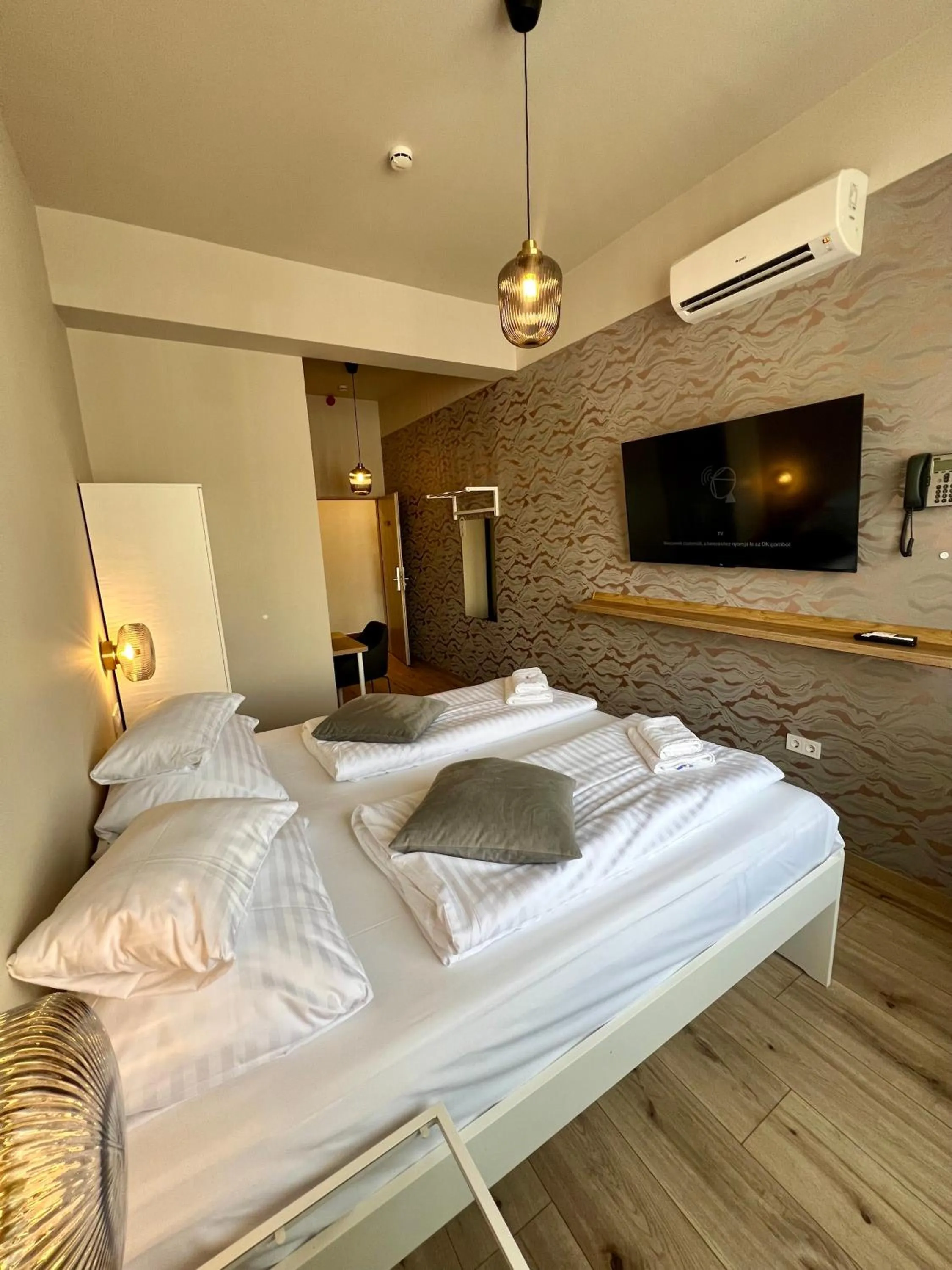 Bed in Boutique Hotel & Event Center