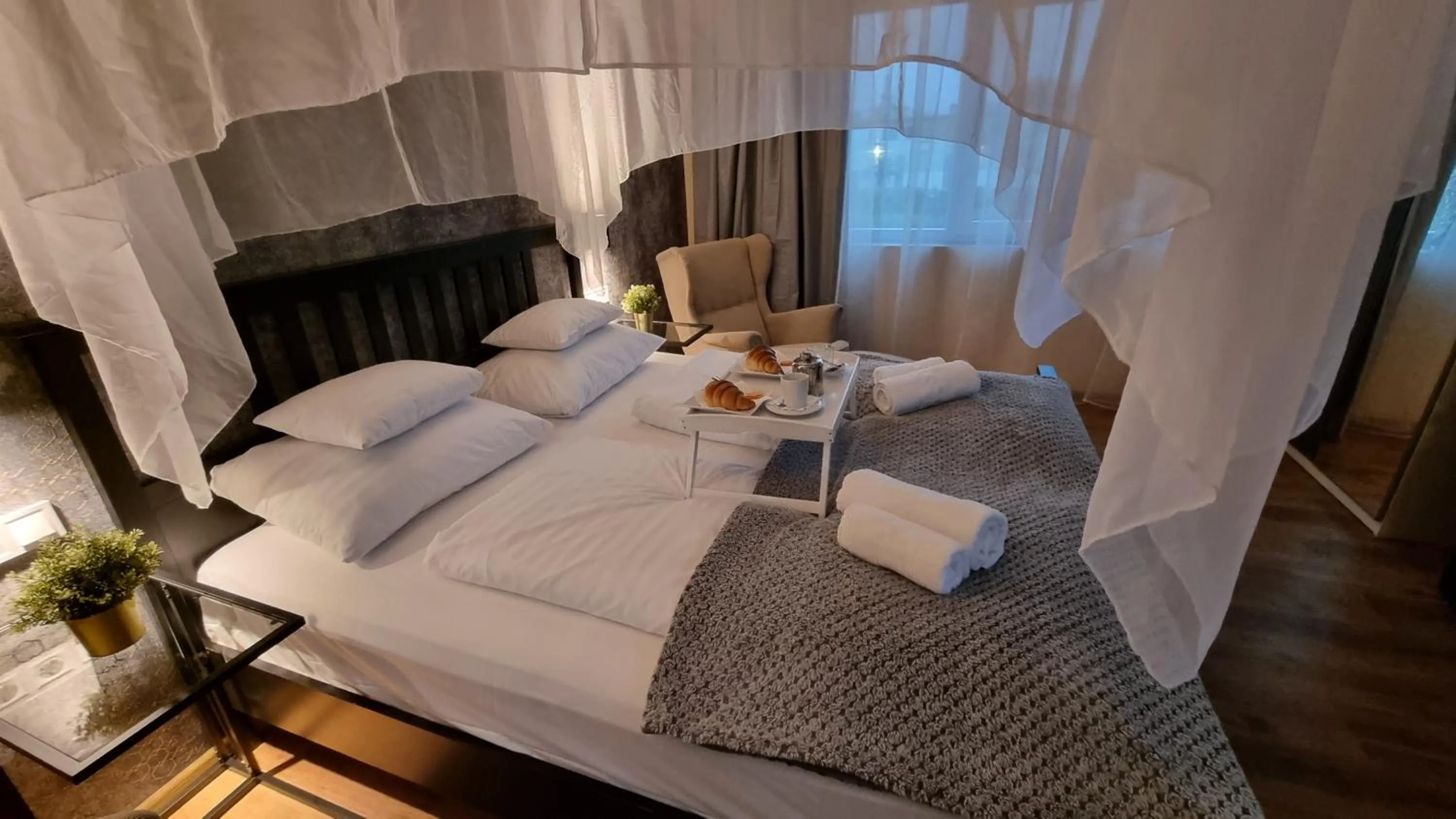 Bed in Boutique Hotel & Event Center