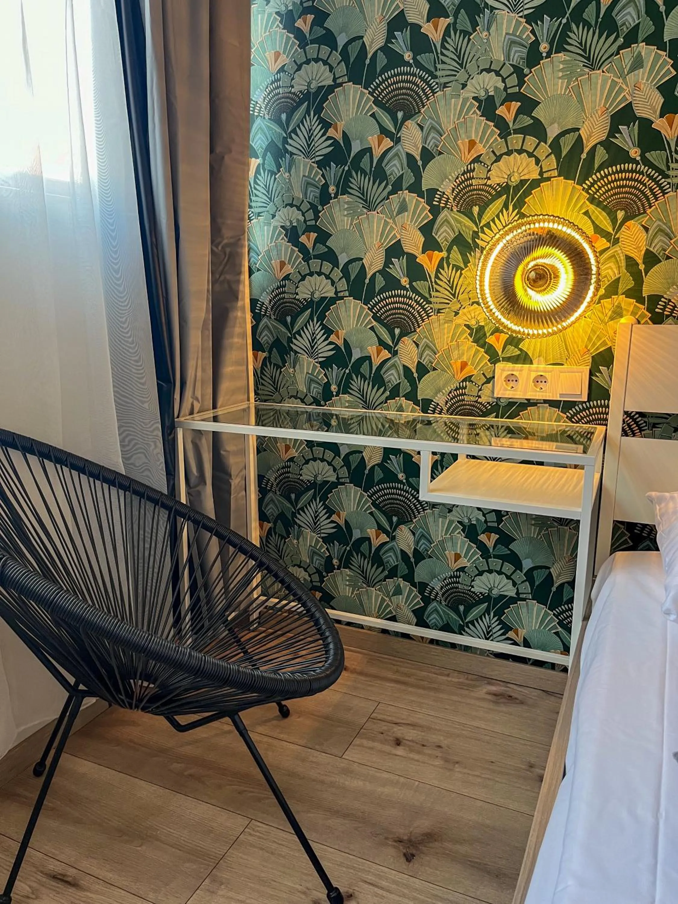 Seating area, Bed in Boutique Hotel & Event Center