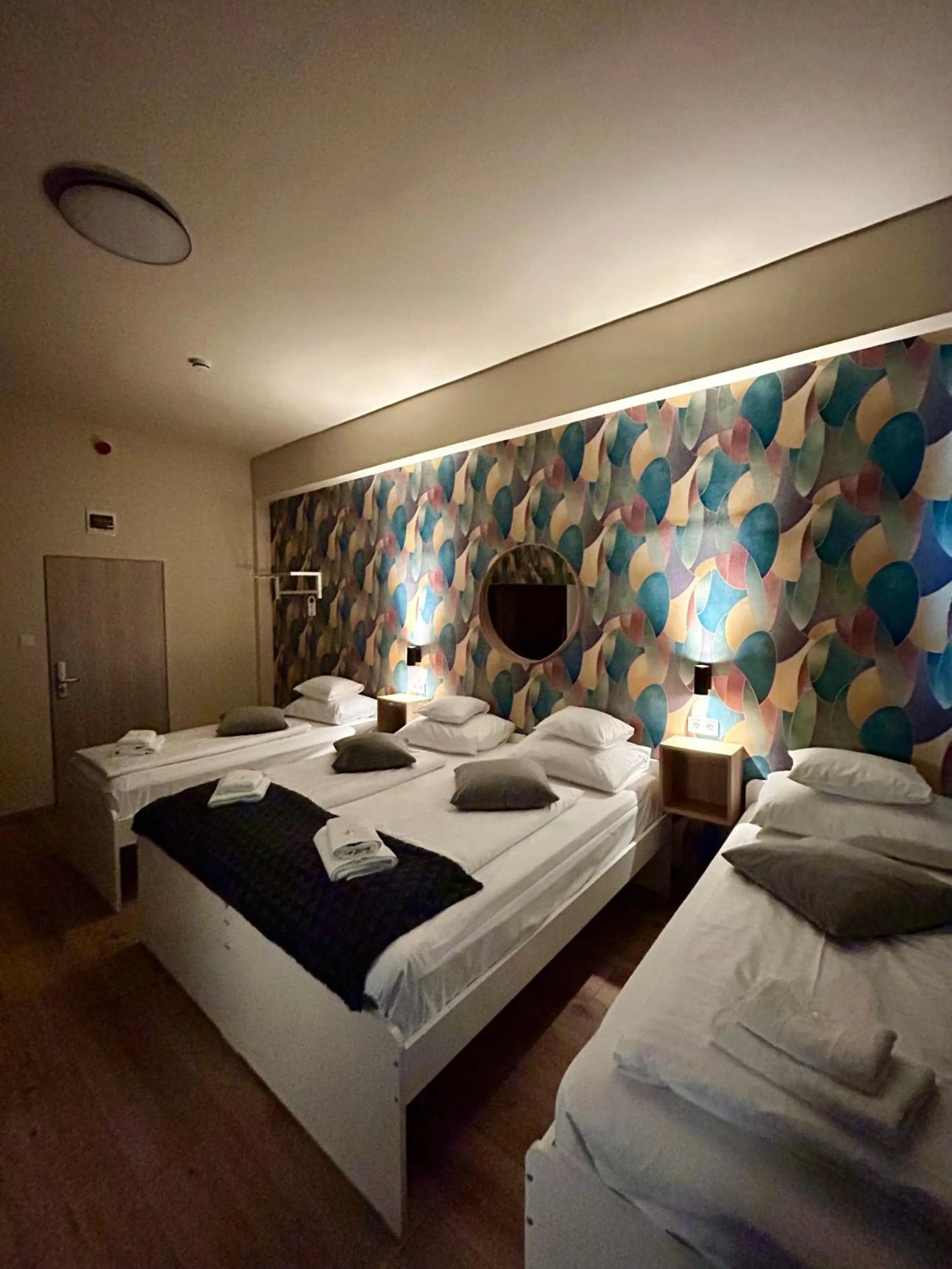 Bed in Boutique Hotel & Event Center