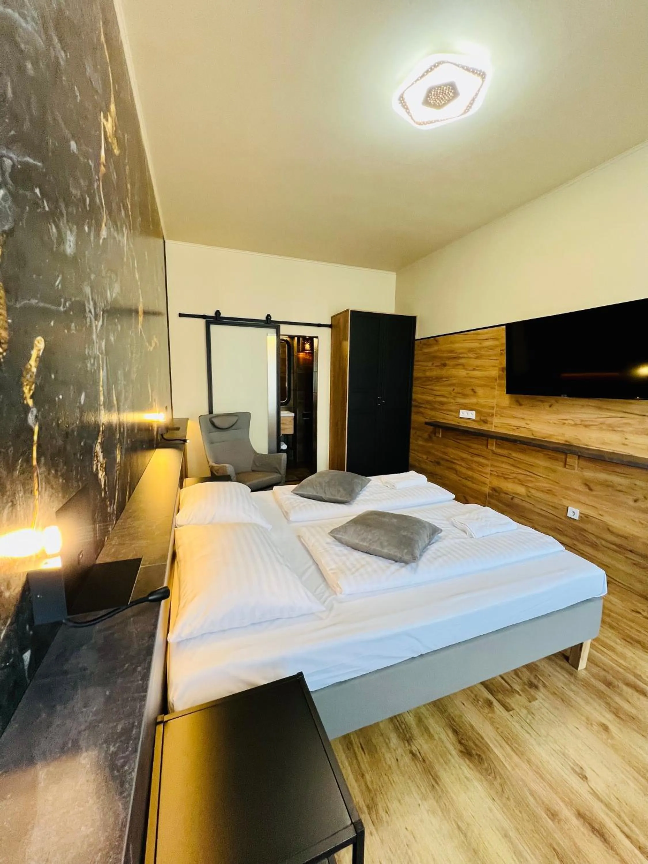 Bed in Boutique Hotel & Event Center