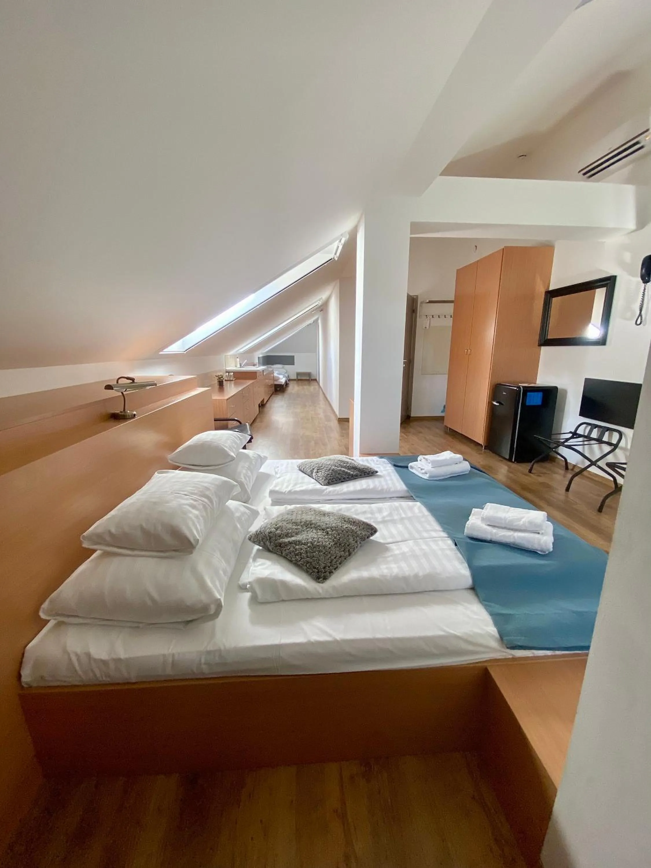 Bed in Boutique Hotel & Event Center