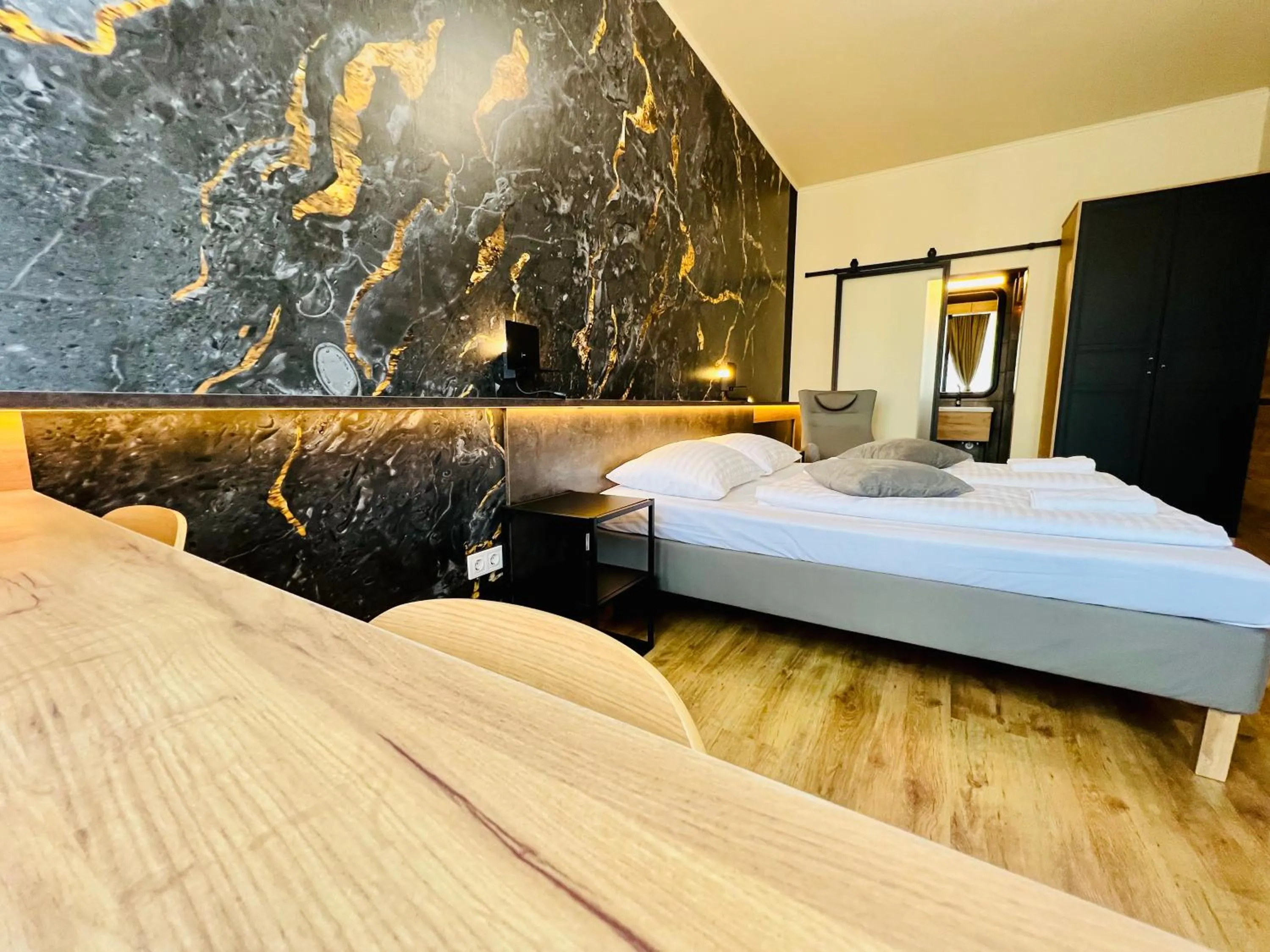 Bed in Boutique Hotel & Event Center