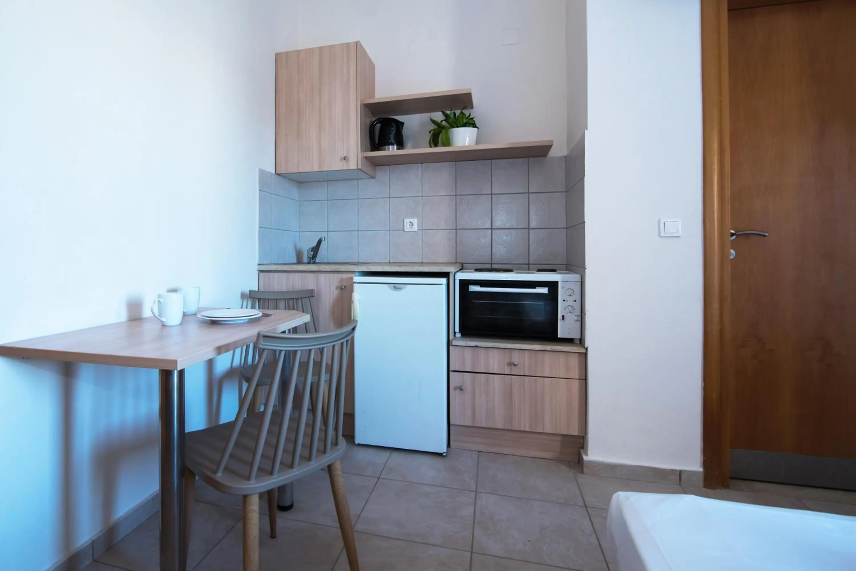 Kitchen or kitchenette in Ilios Malia Hotel Resort