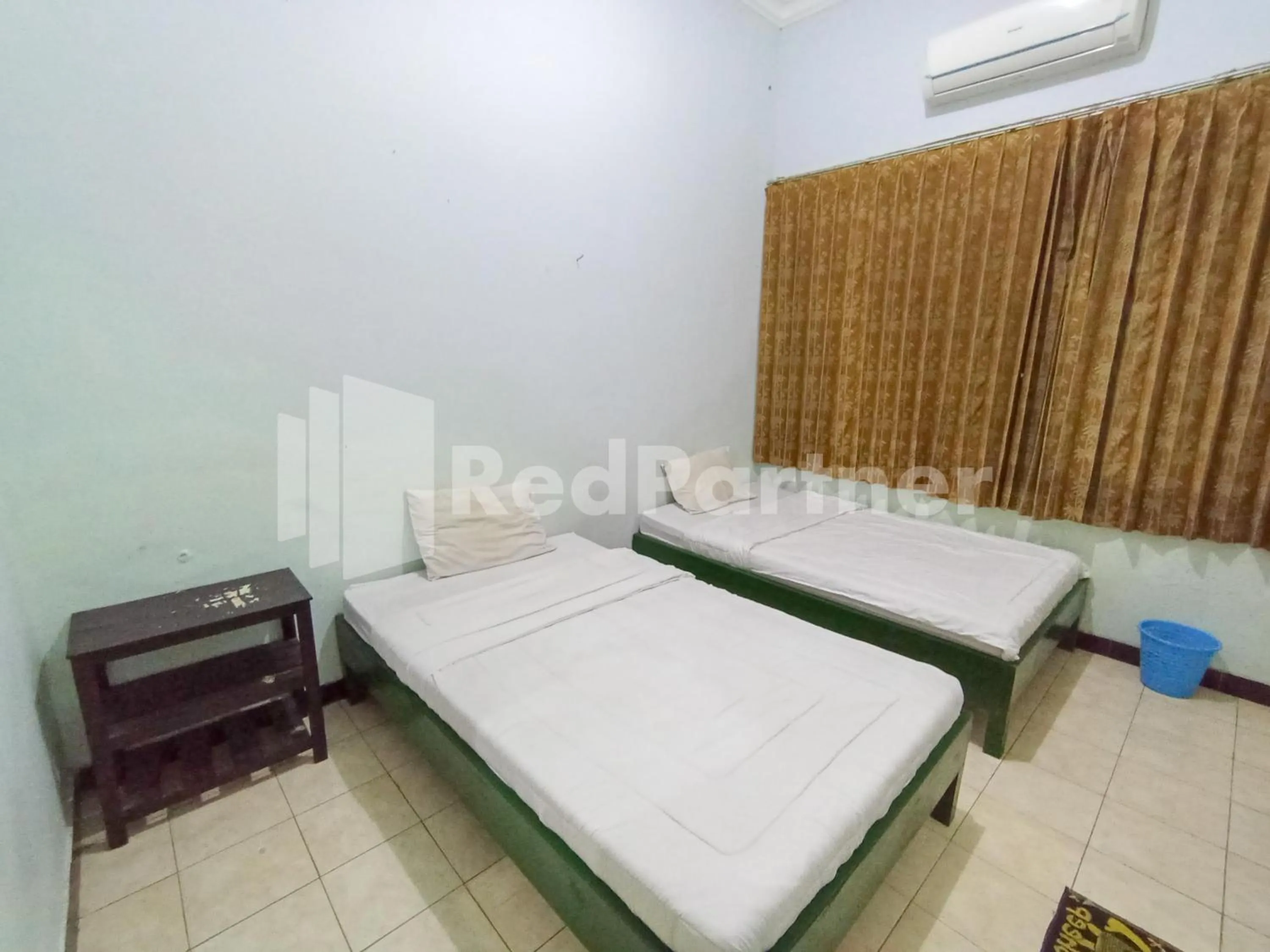 Bedroom, Bed in Orange inn RedPartner Madiun