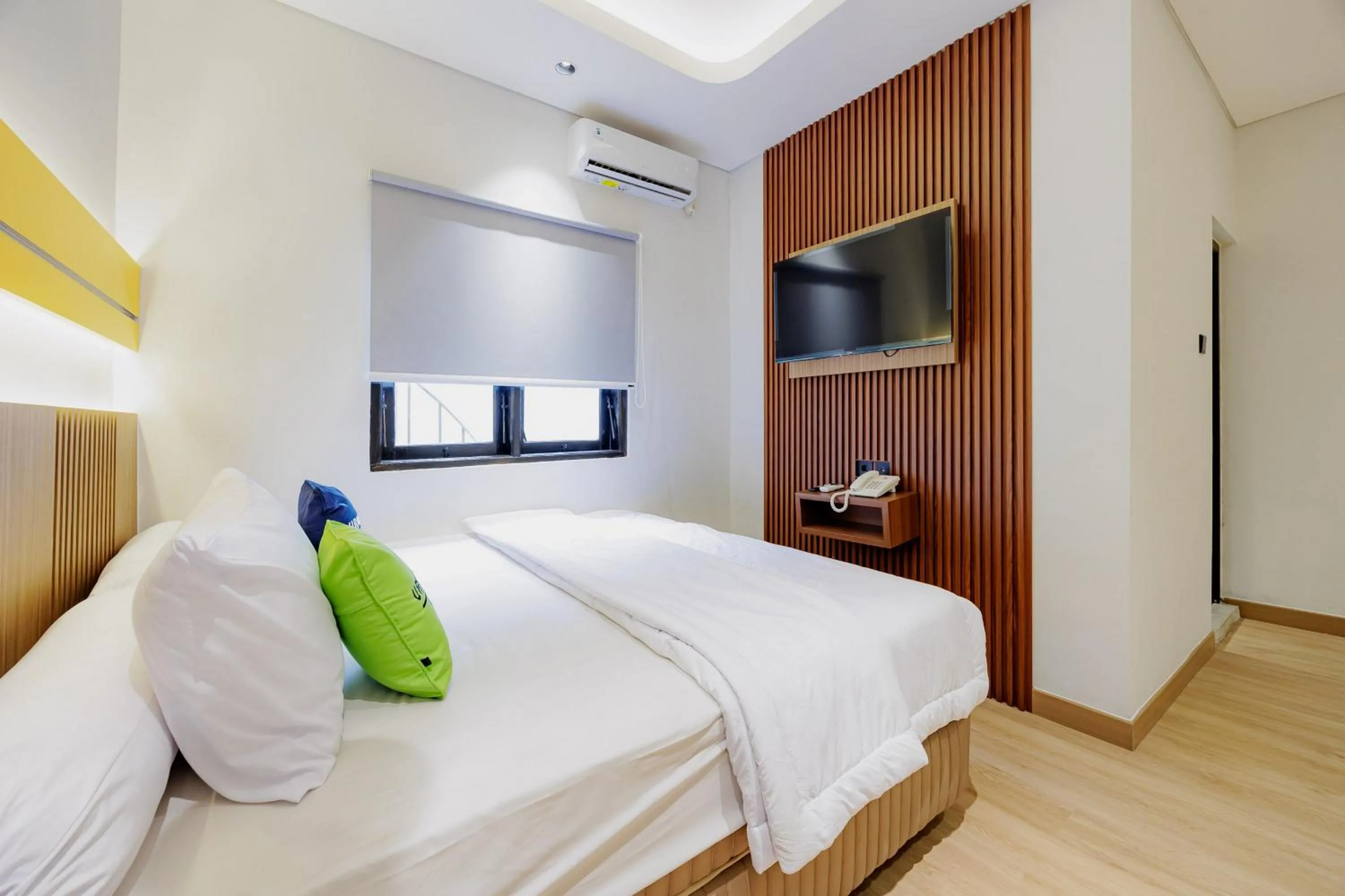Bedroom, Bed in Urbanview Hotel Yampi TB Simatupang