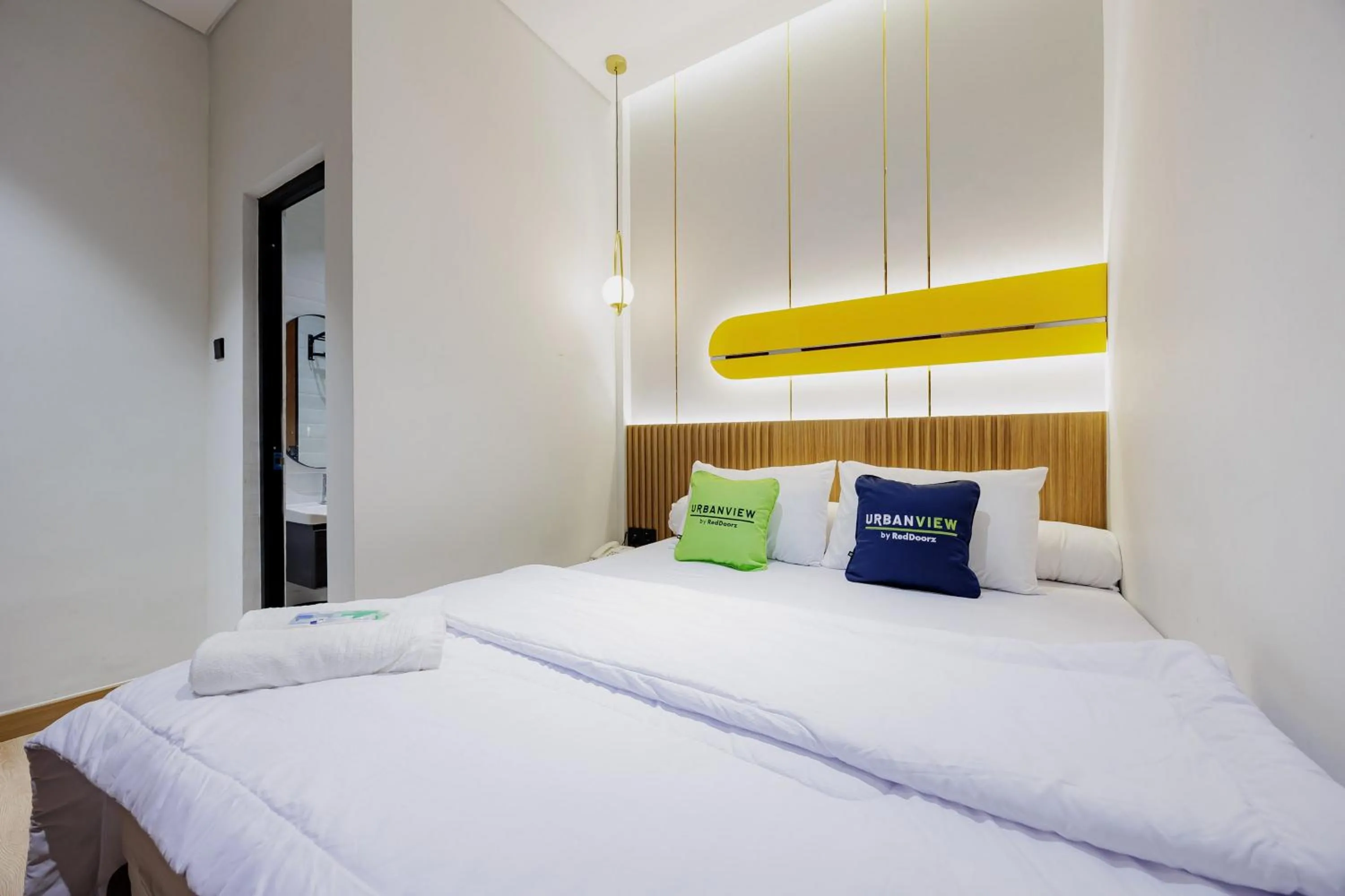 Bedroom, Bed in Urbanview Hotel Yampi TB Simatupang