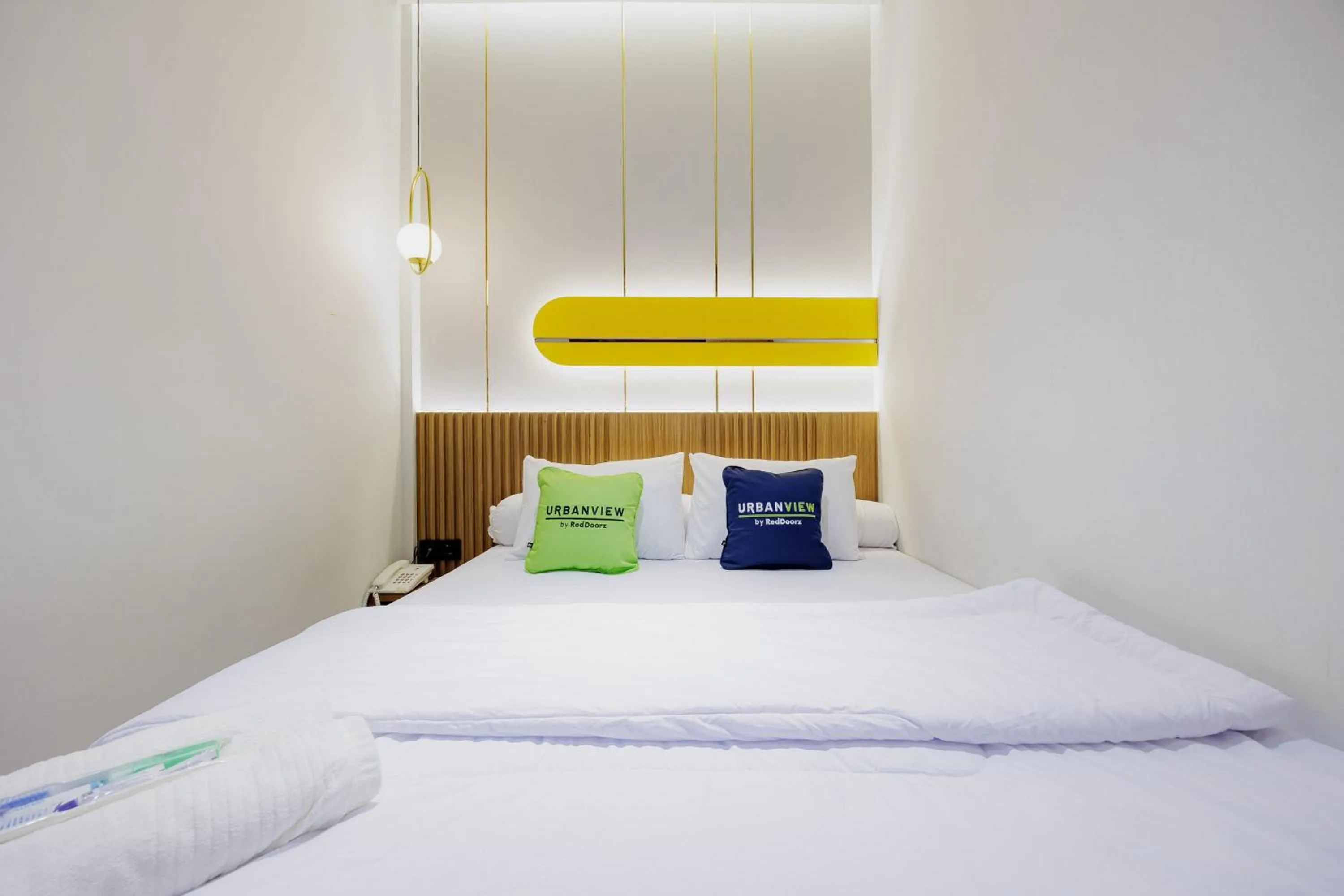 Bedroom, Bed in Urbanview Hotel Yampi TB Simatupang
