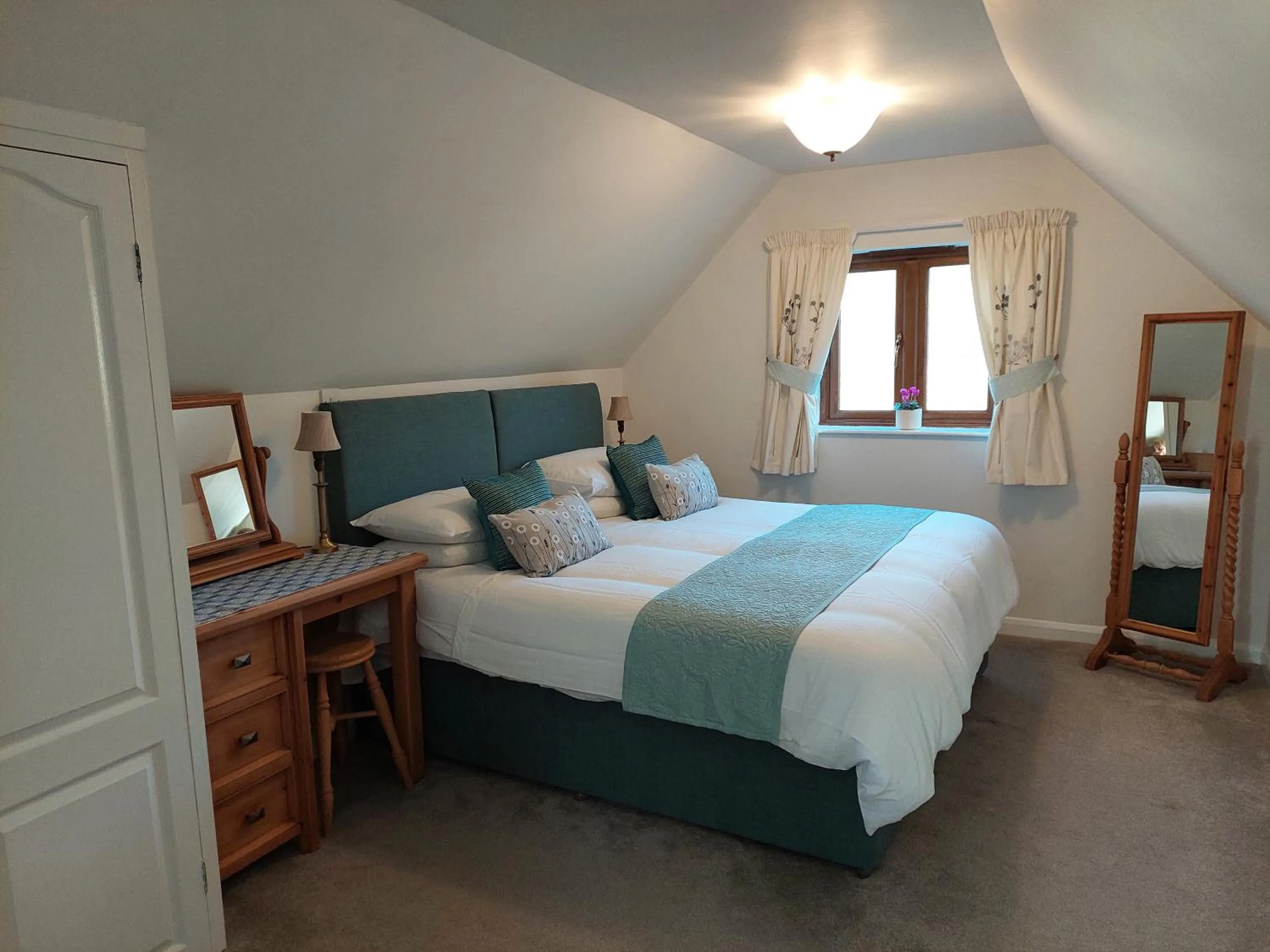 Bed in Innisfree Cottage