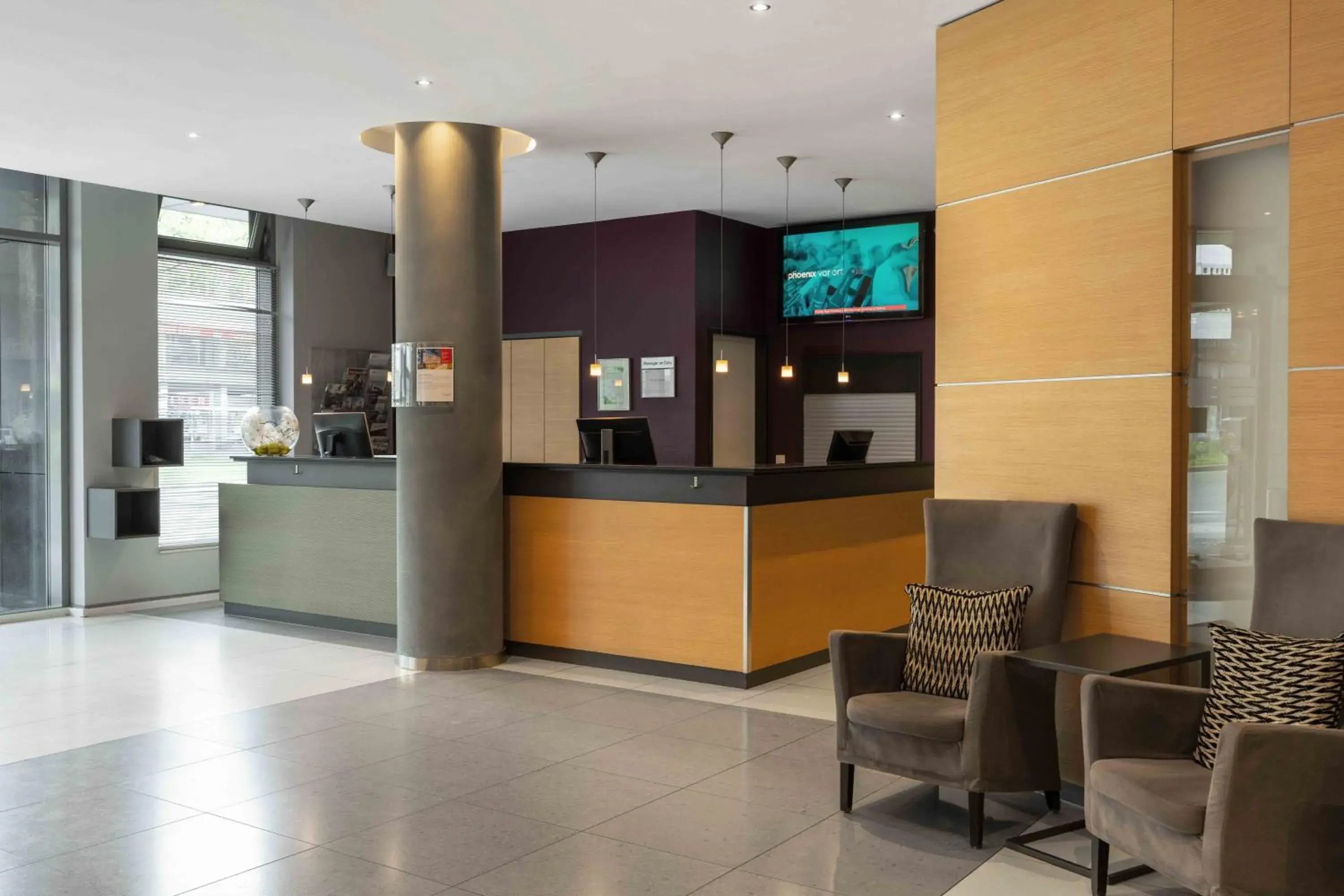Lobby or reception in Ramada by Wyndham Essen Lobby or reception in Ramada by Wyndham Essen