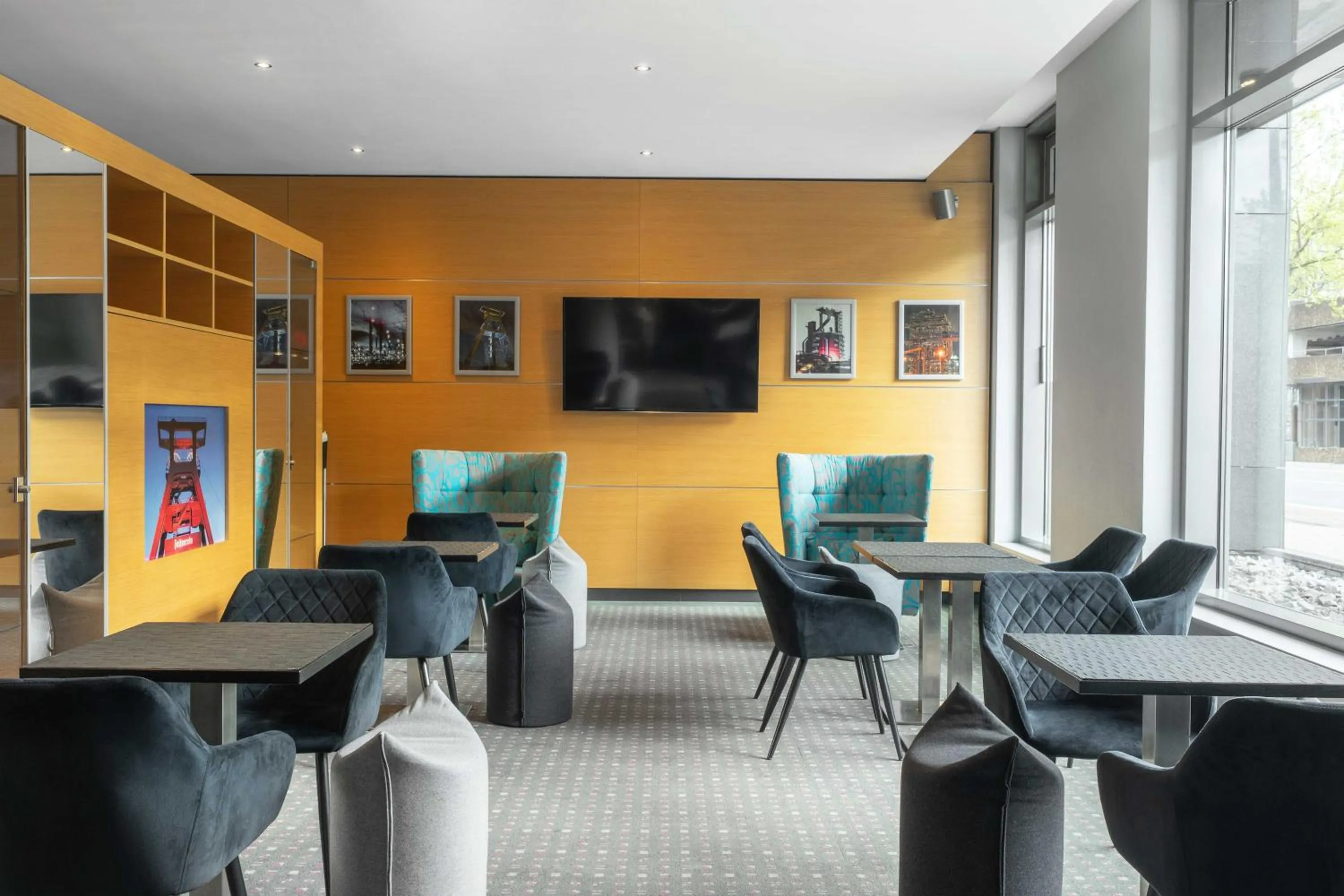 Communal lounge/ TV room in Ramada by Wyndham Essen