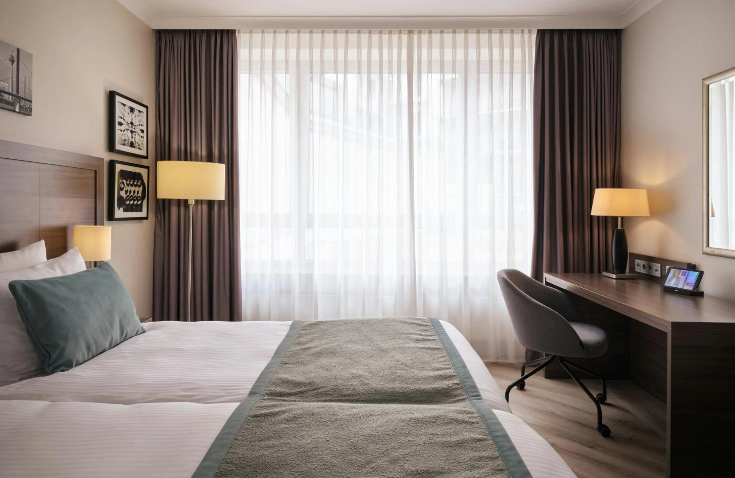 Photo of the whole room, Bed in Leonardo Royal Hotel Düsseldorf Königsallee