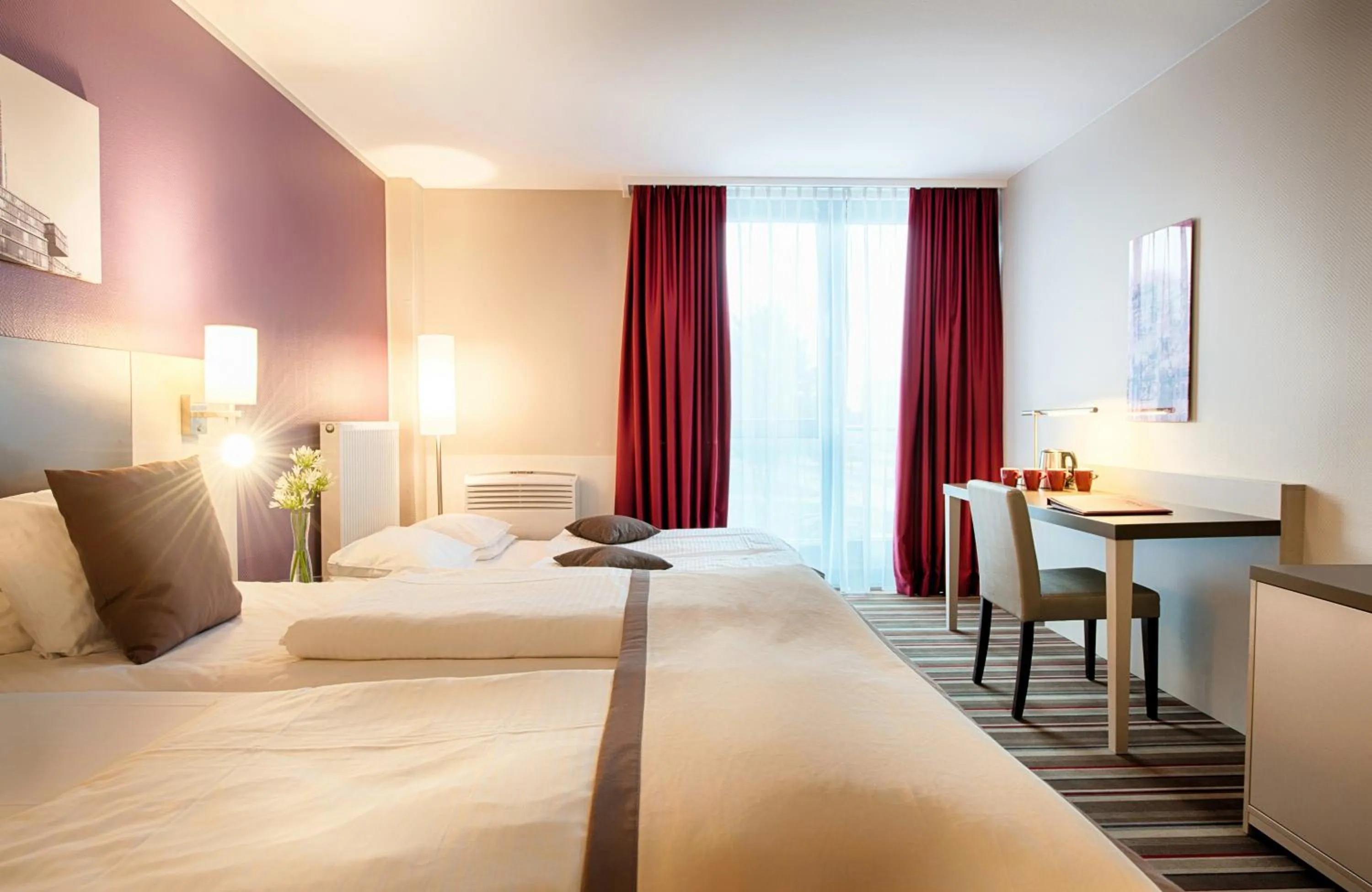 Photo of the whole room, Bed in Leonardo Hotel Hannover Airport