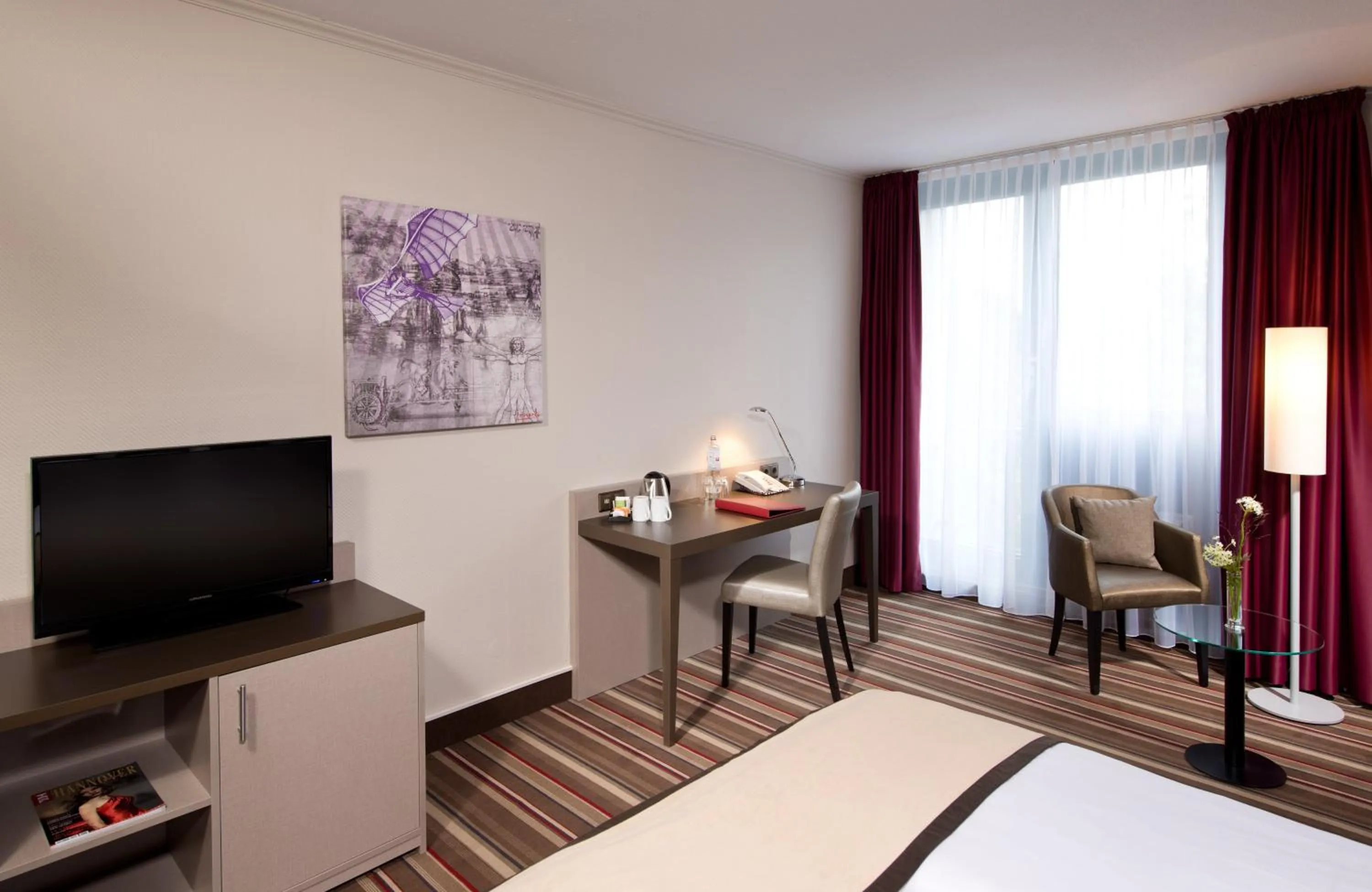 Photo of the whole room, Bed in Leonardo Hotel Hannover Airport