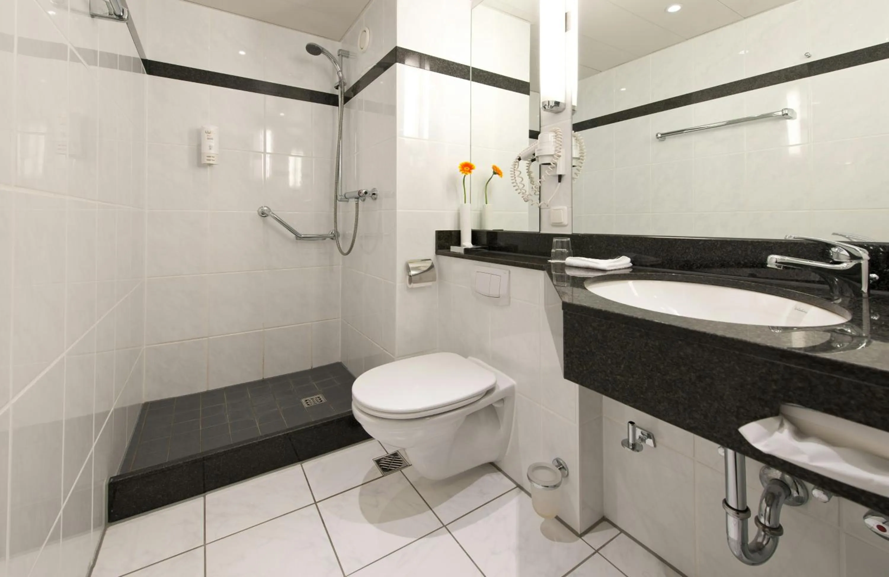 Bathroom in Leonardo Hotel Heidelberg