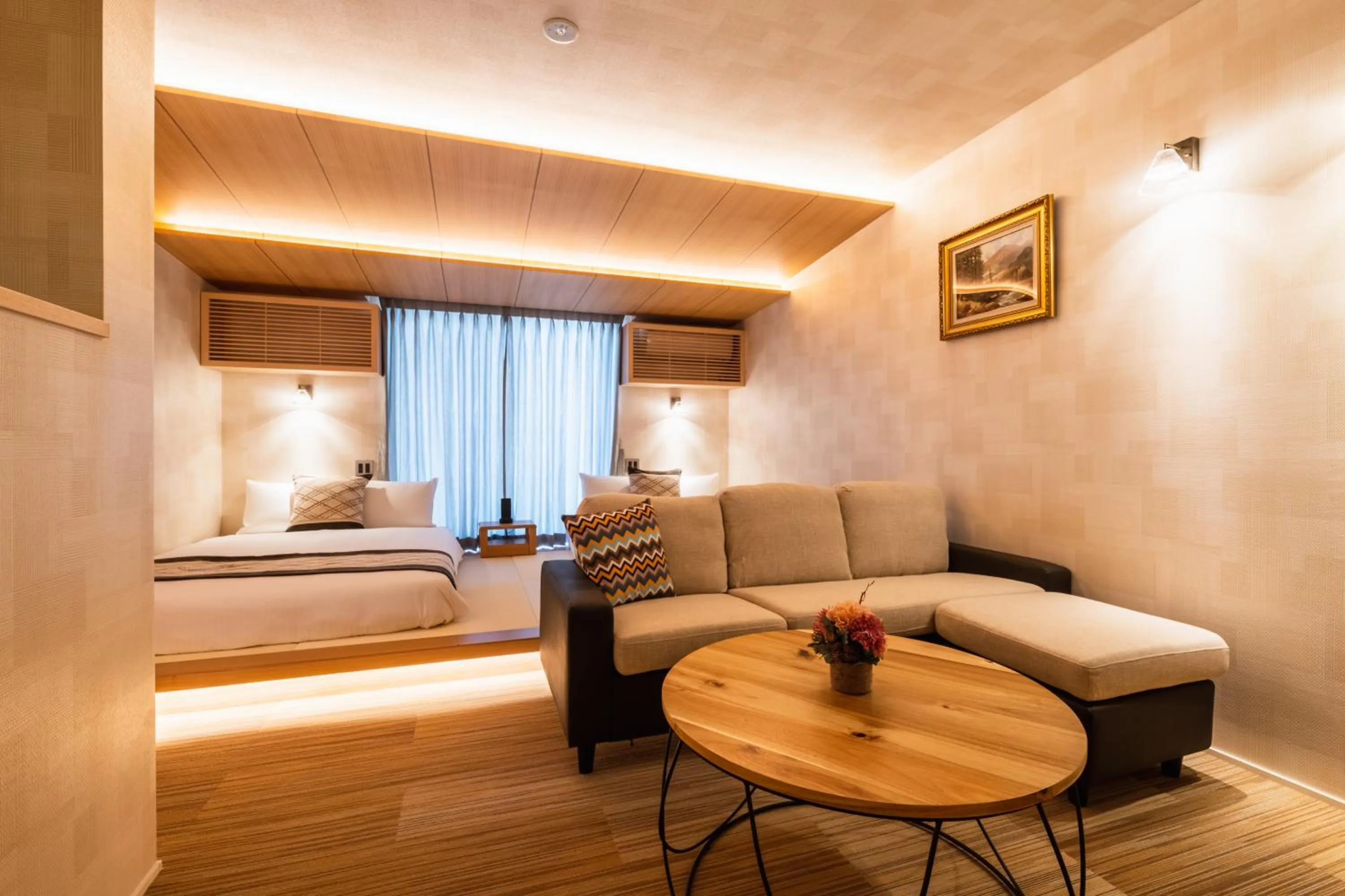 Living room, Bed in GRAND BASE Mojiko Ekimae