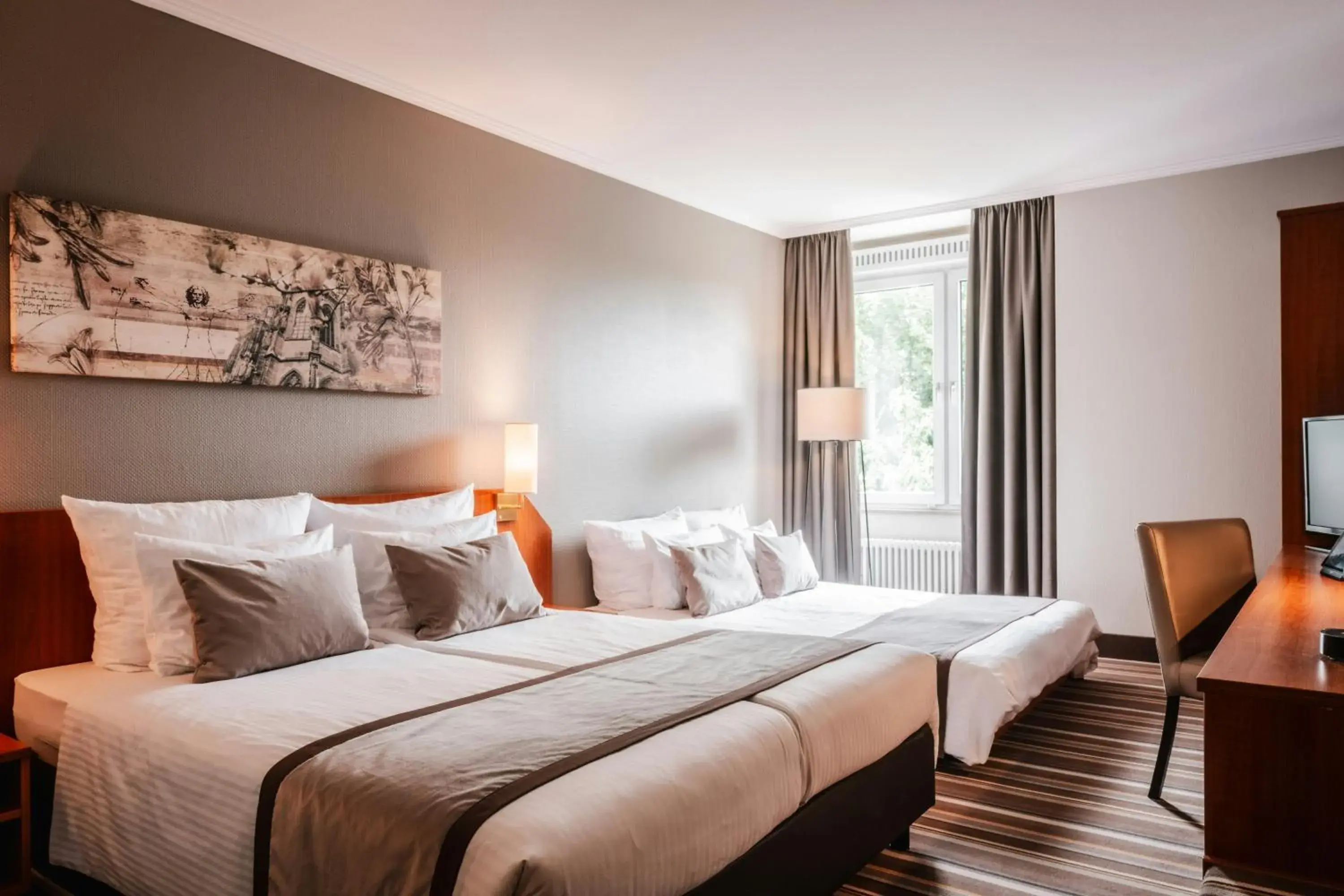 Photo of the whole room, Bed in Leonardo Hotel Aachen Photo of the whole room, Bed in Leonardo Hotel Aachen