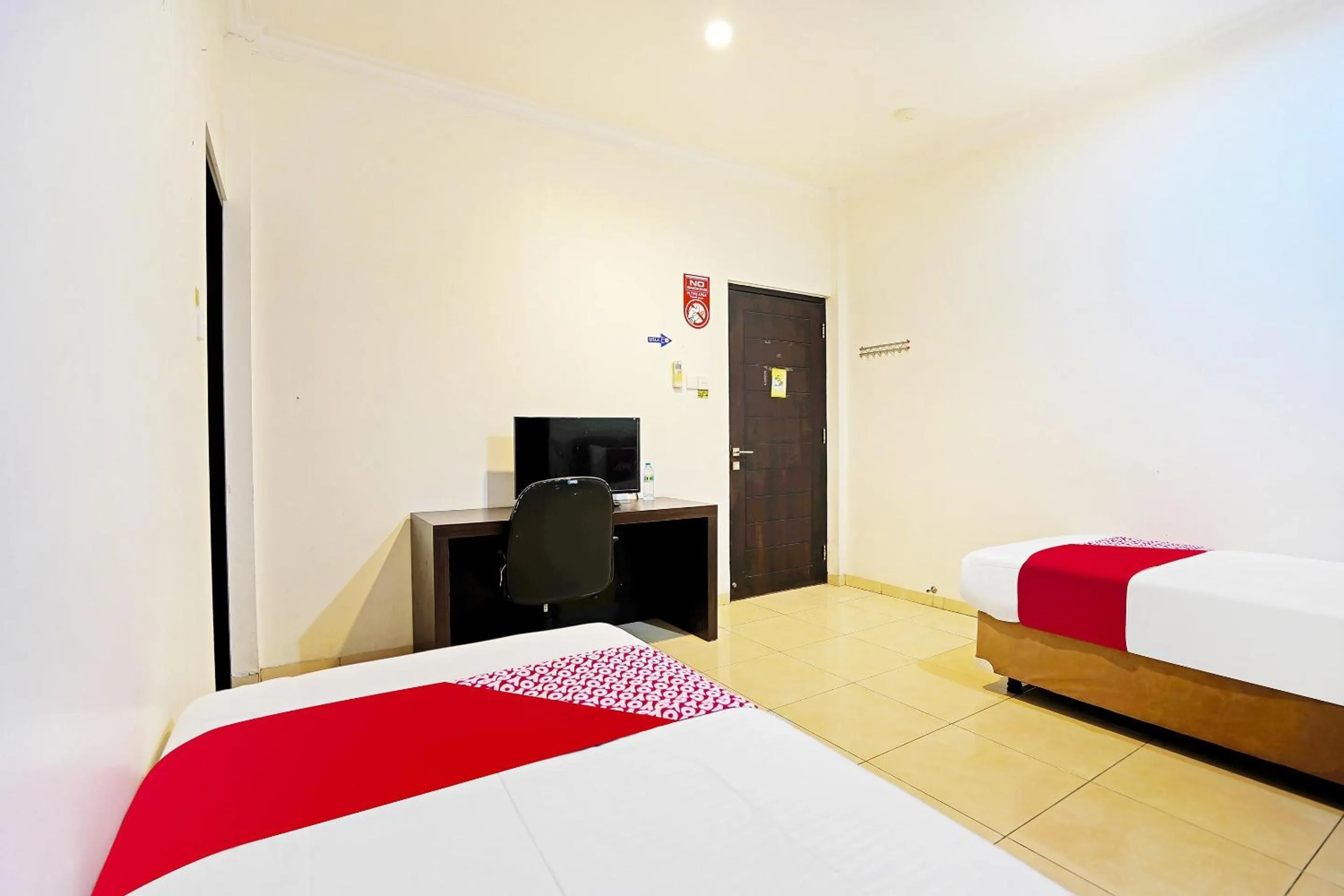 Bedroom in Hotel O Pondok Inap Shofwa 2