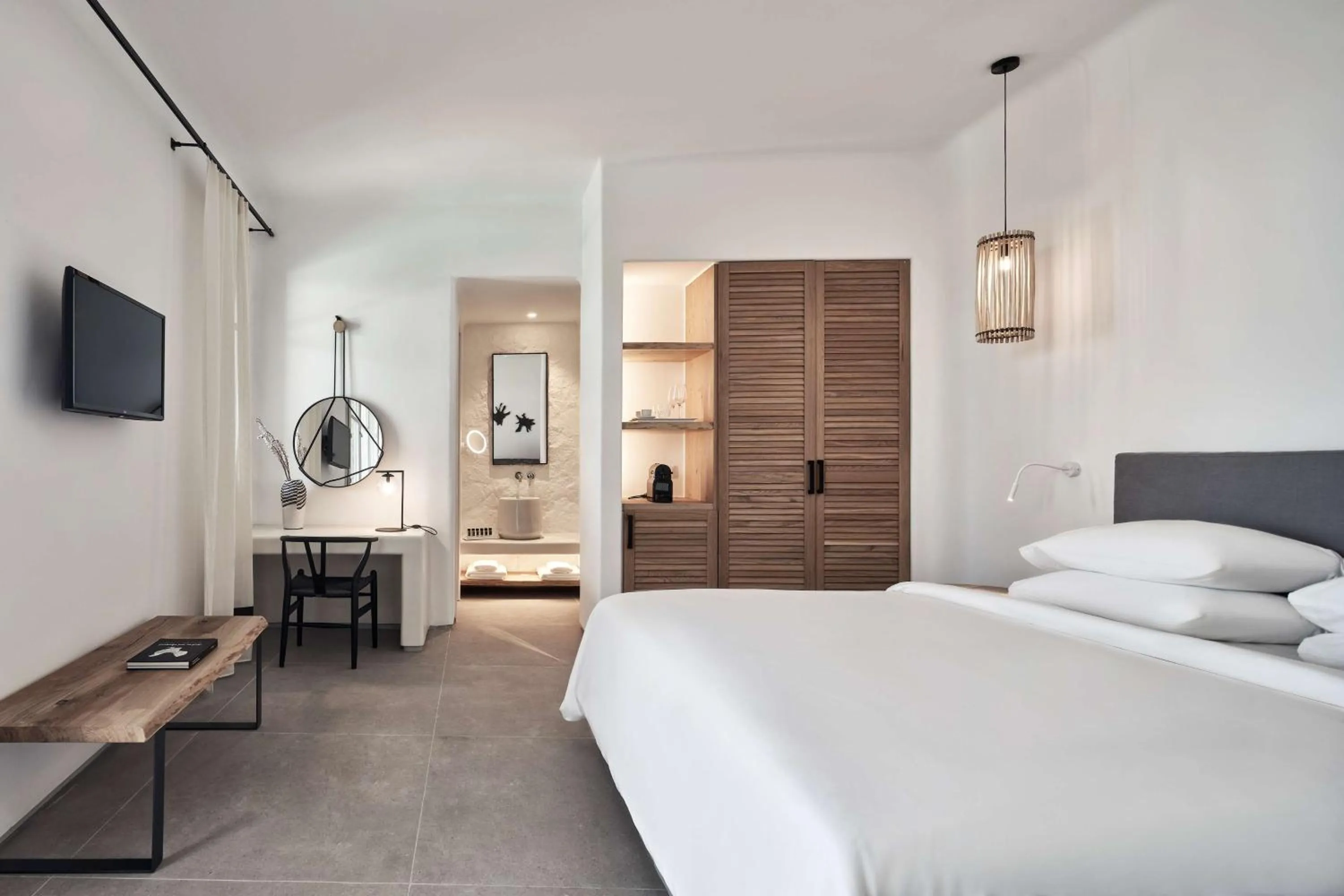 Photo of the whole room, Bed in Radisson Blu Euphoria Resort, Mykonos