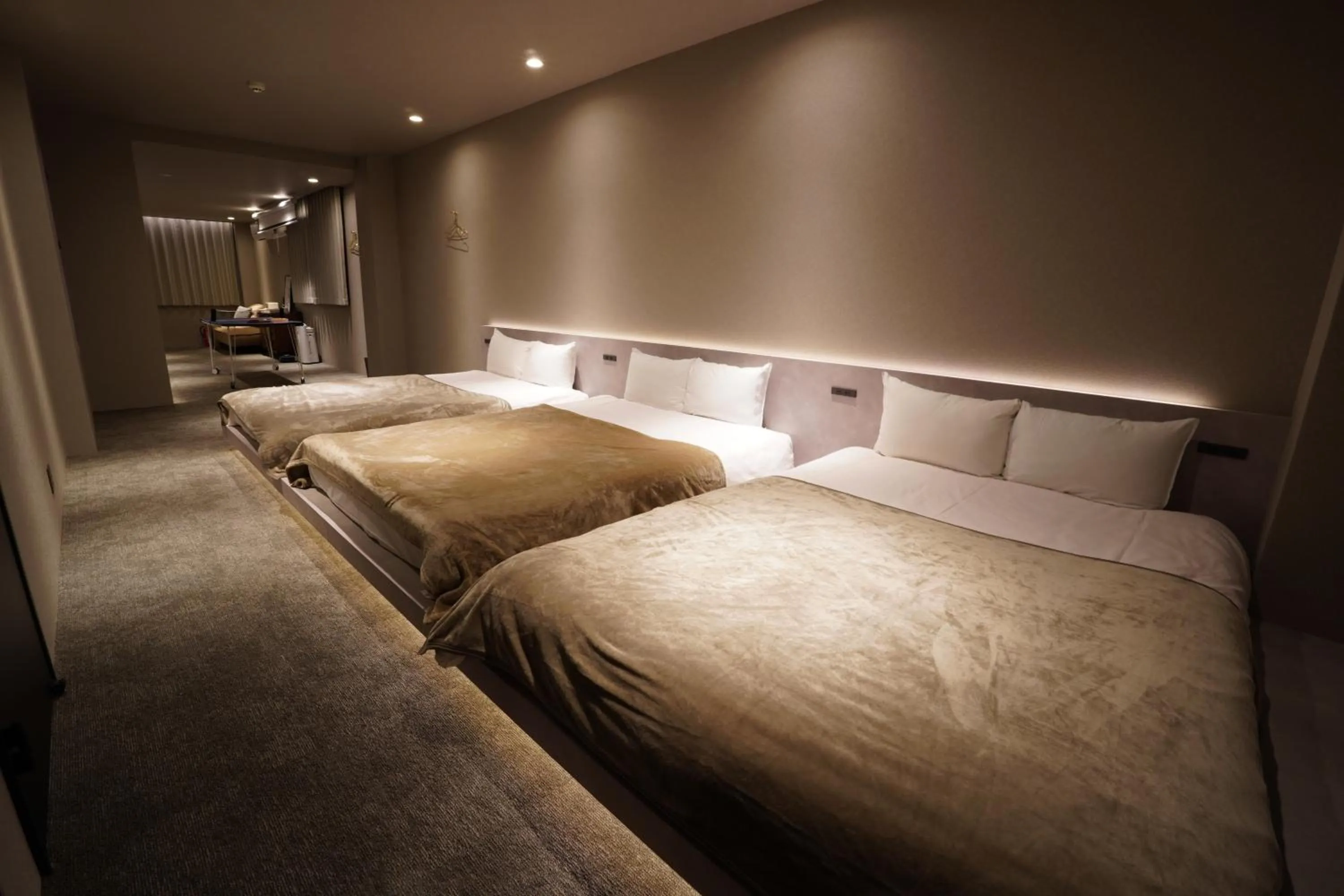 Bed in TABISAI HOTEL Luxe 博多