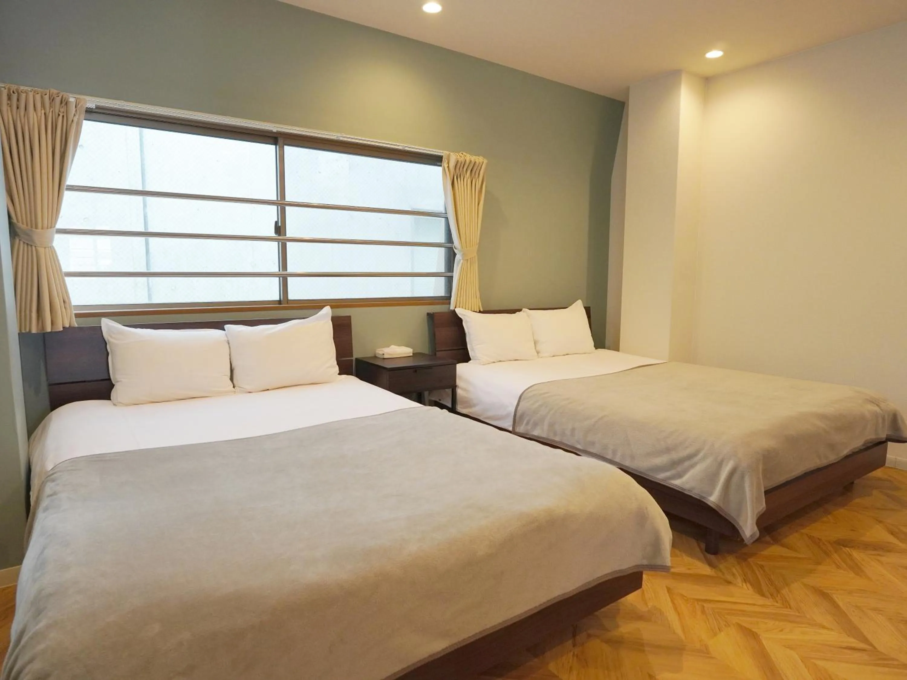 Bed in TABISAI HOTEL Premium 博多-中洲