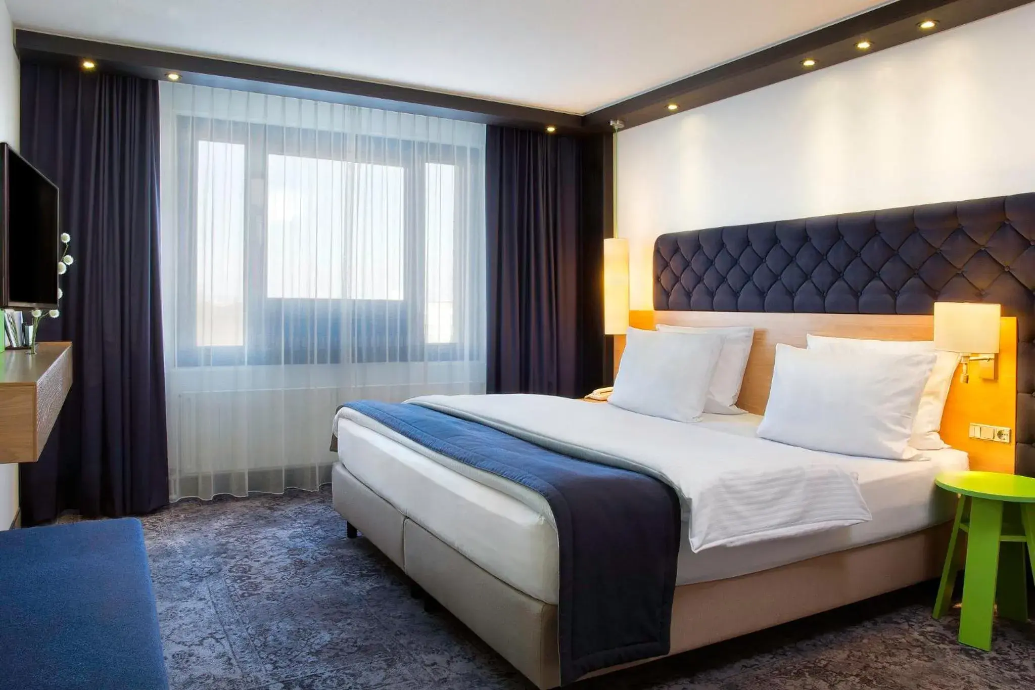 Photo of the whole room, Bed in Holiday Inn Stuttgart by IHG Photo of the whole room, Bed in Holiday Inn Stuttgart by IHG