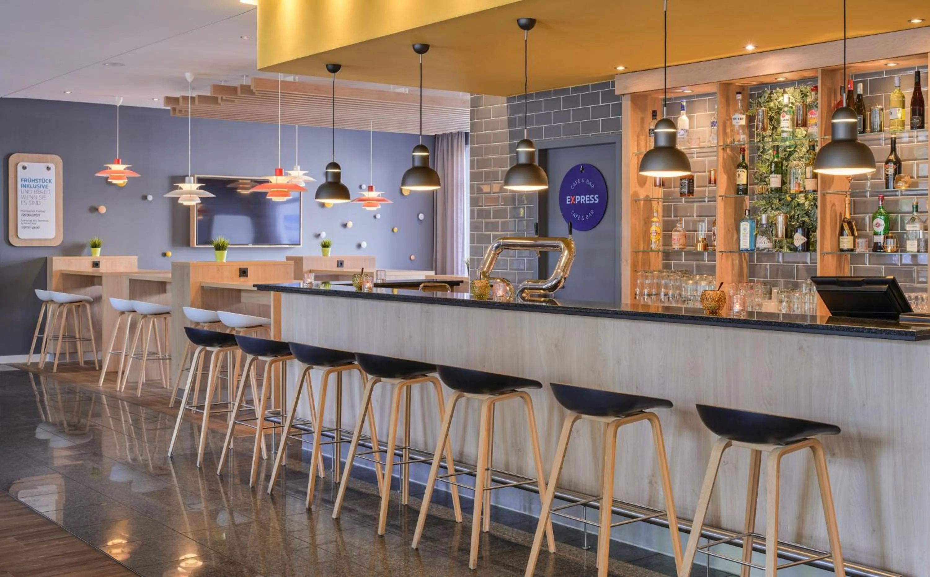 Lounge or bar in Holiday Inn Express Frankfurt Messe by IHG