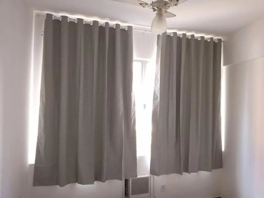 Photo of the whole room in APARTAMENTO COPACABANA saleta, quarto grande com ar cond wi-fi a 2 qds da praia