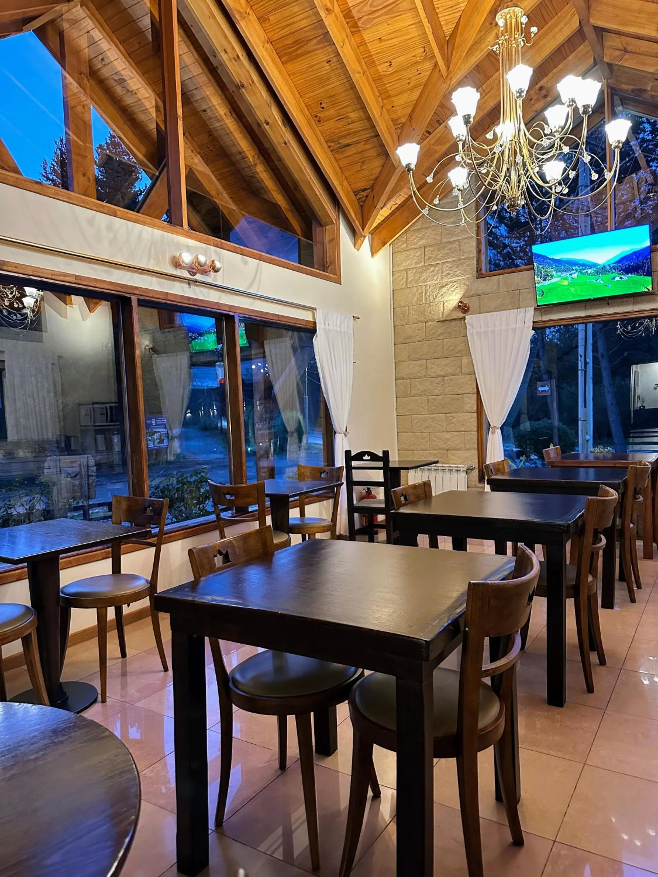 Communal lounge/ TV room in Posada del Ciprés