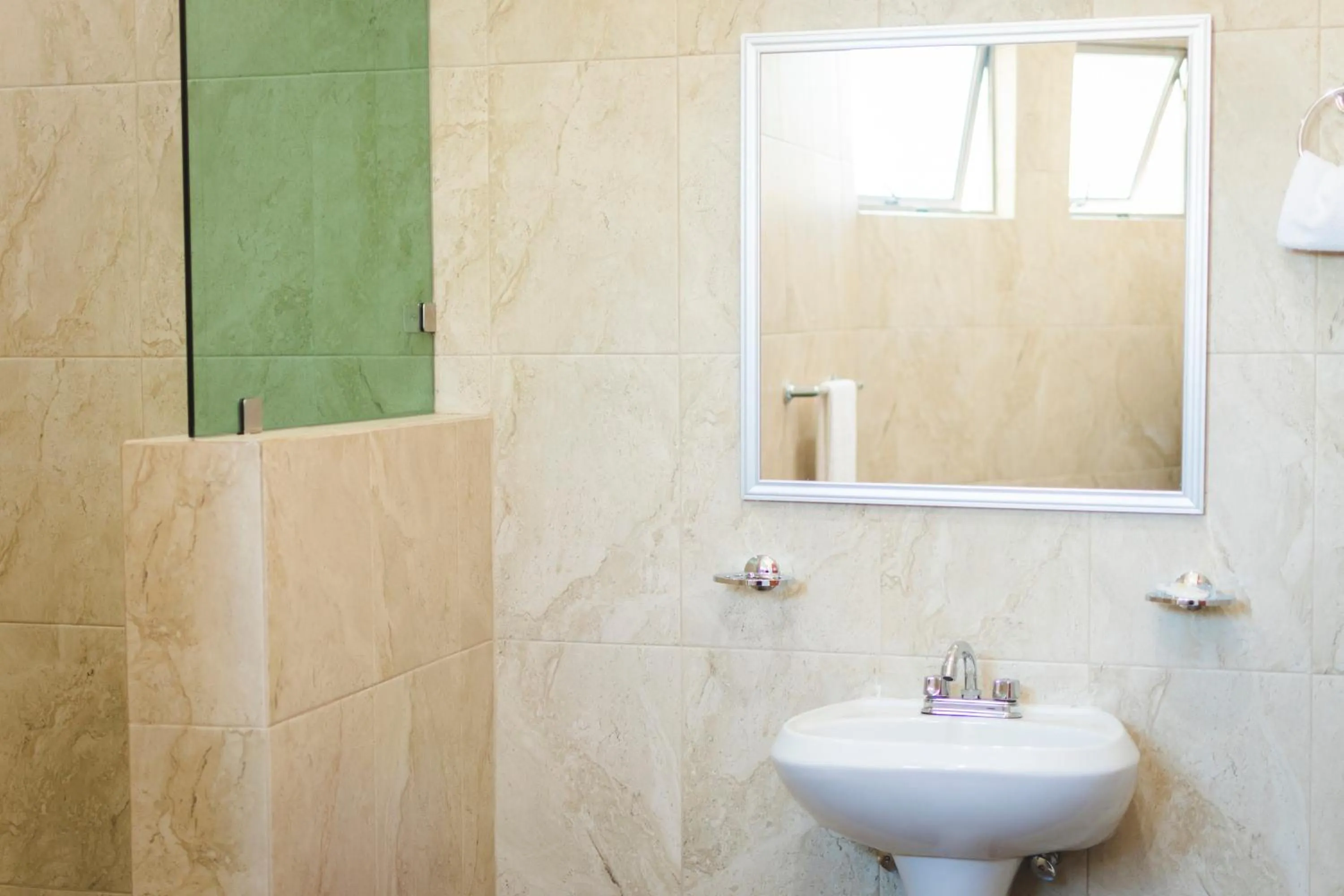 Bathroom in La Lola Hotel & Suites