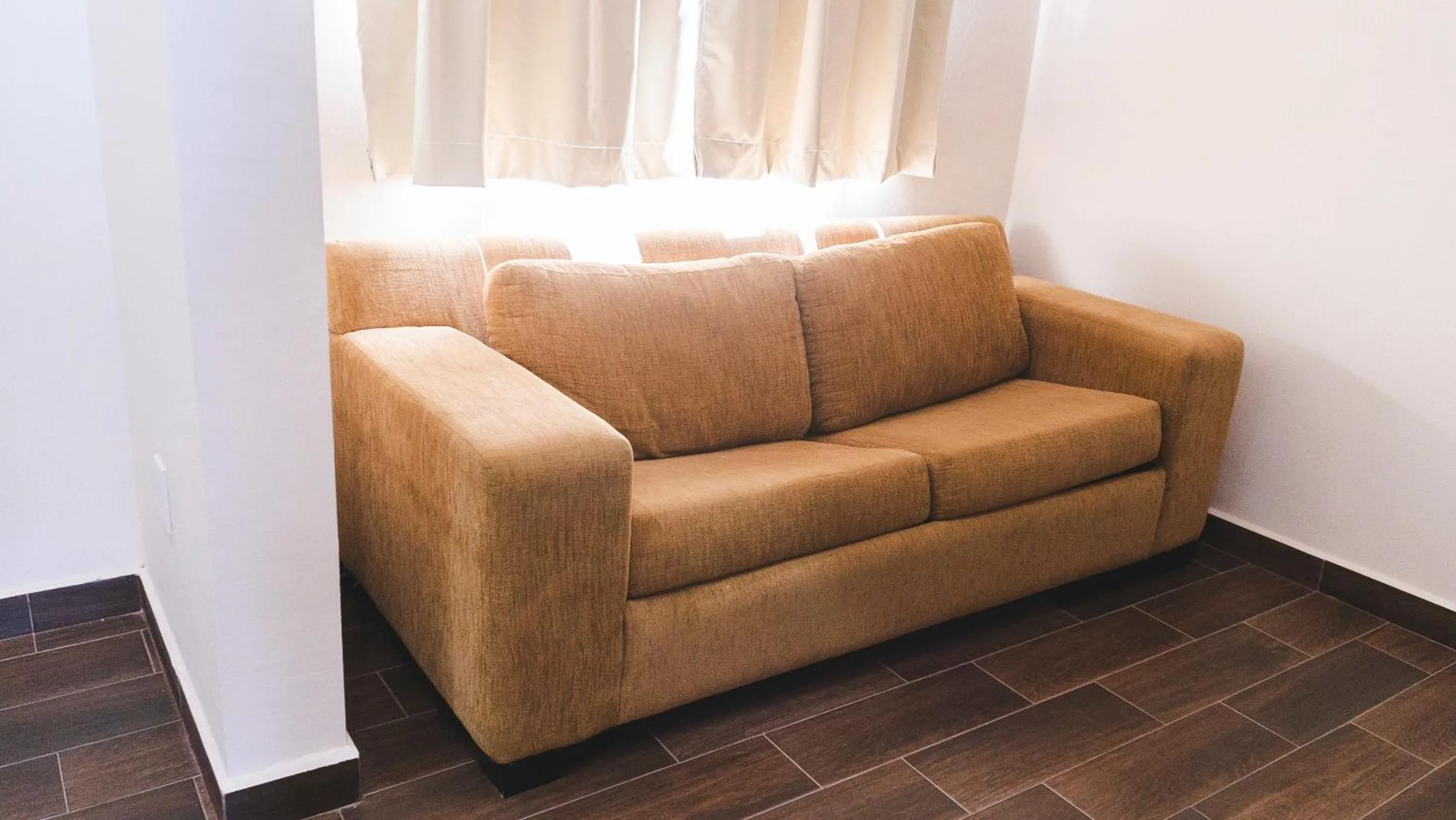 Seating area in La Lola Hotel & Suites