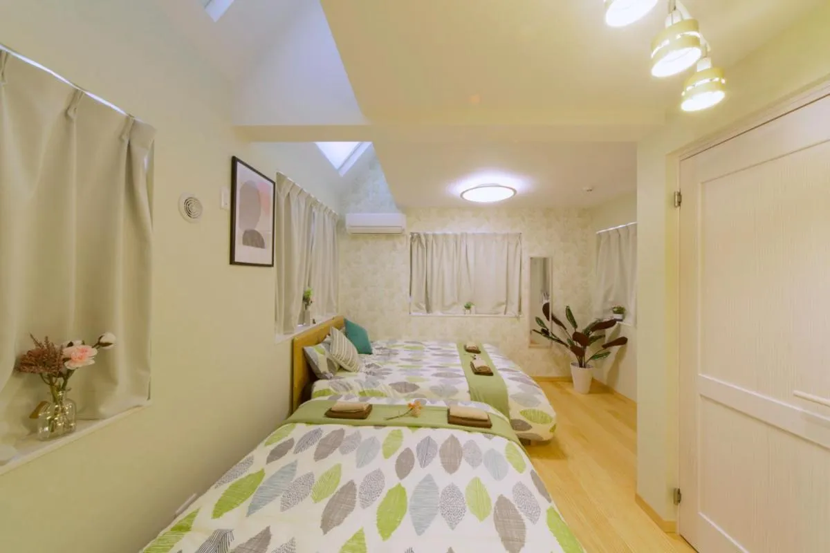 Bed in nestay villa tokyo otsuka