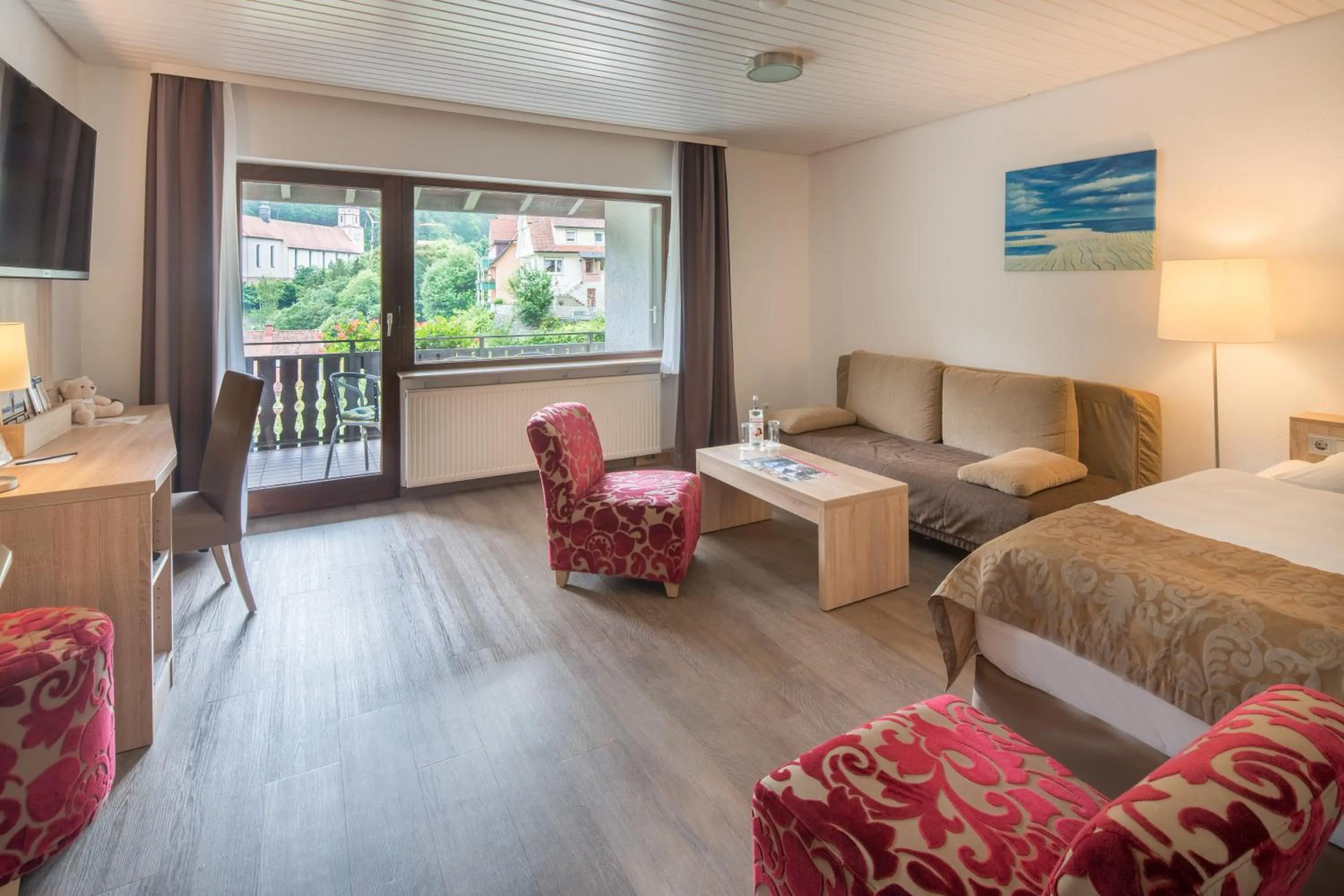 Living room, Bed in Best Western Plus Schwarzwald Residenz