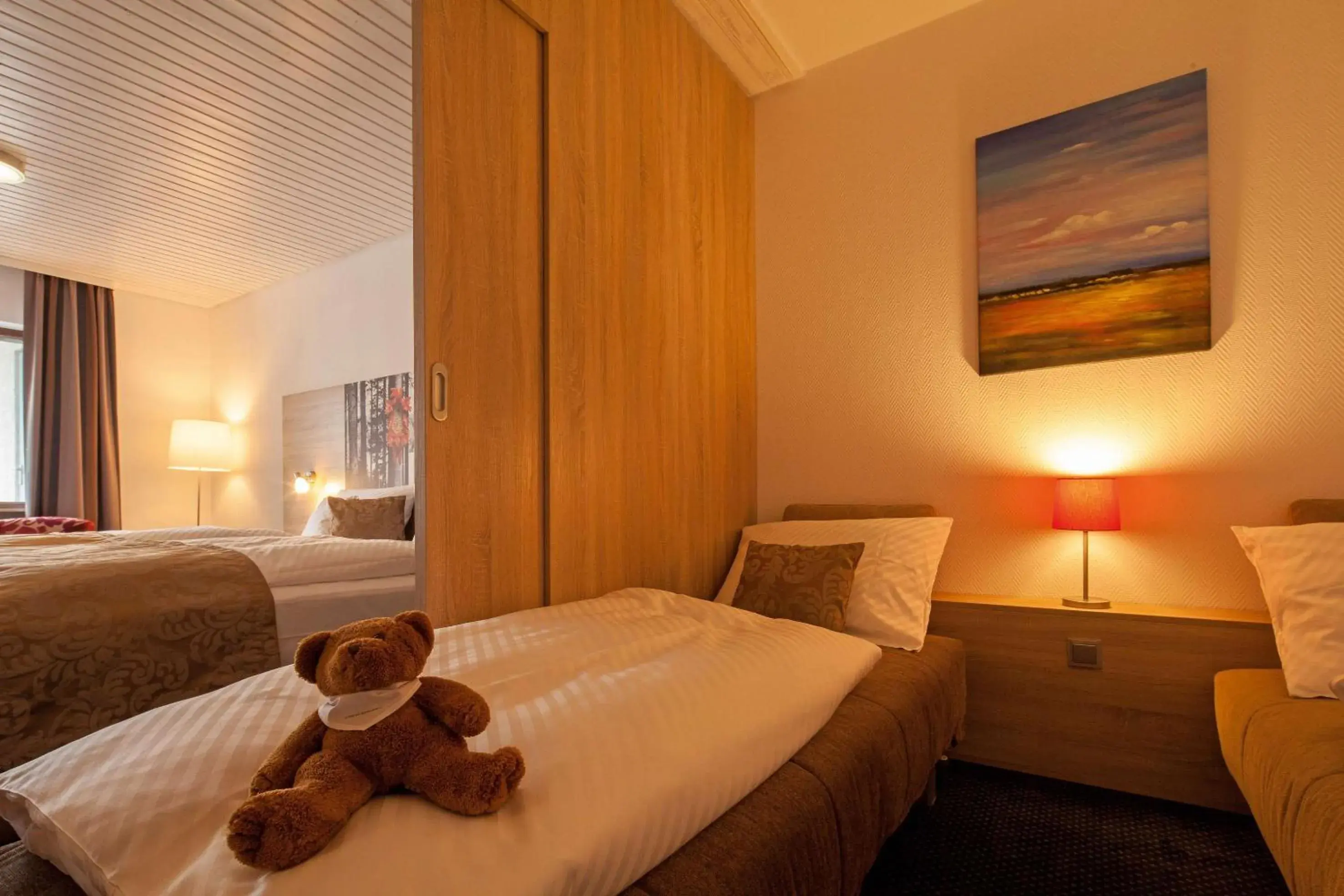 Bedroom, Bed in Best Western Plus Schwarzwald Residenz Bedroom, Bed in Best Western Plus Schwarzwald Residenz