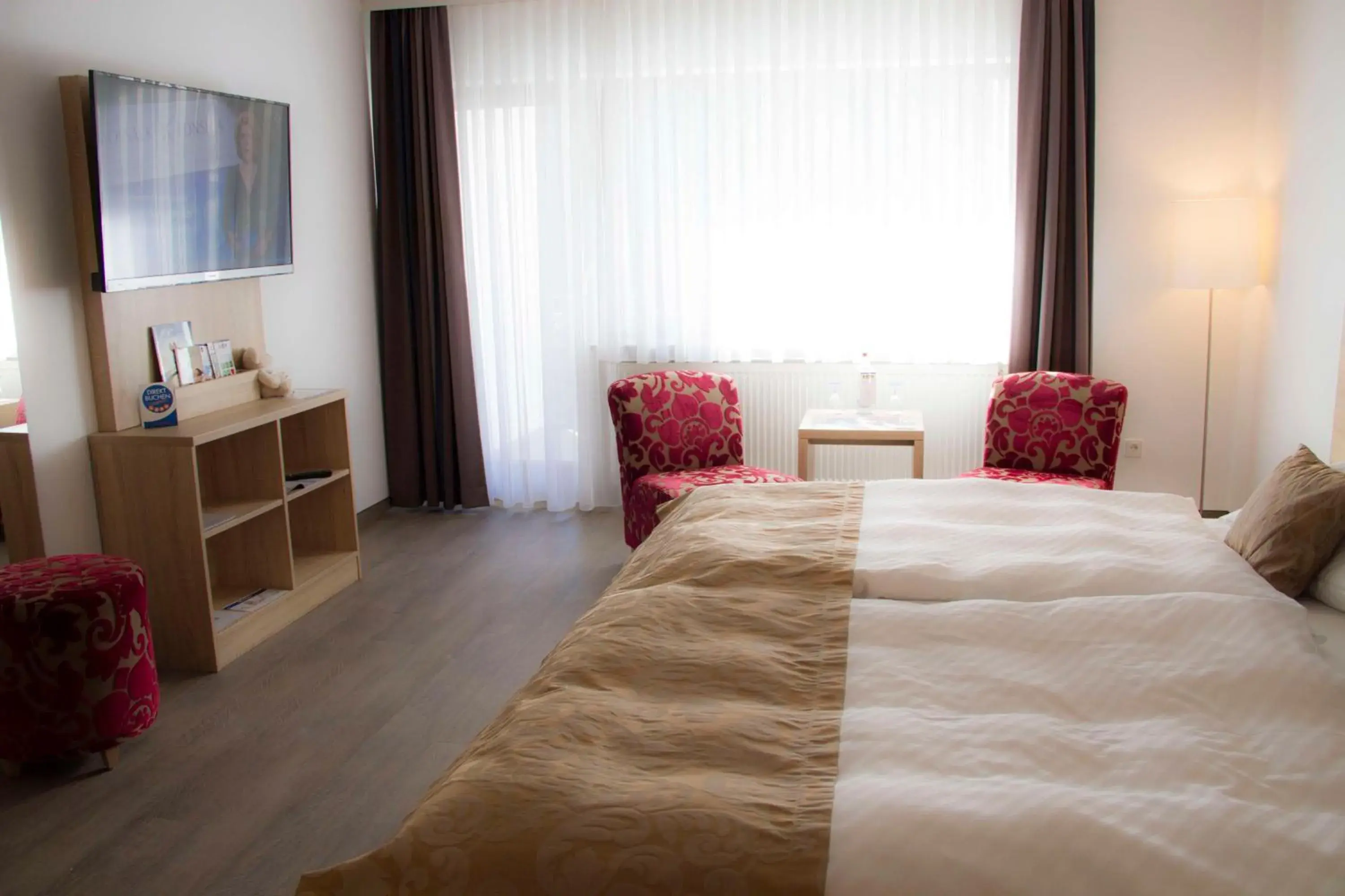 Bedroom, Bed in Best Western Plus Schwarzwald Residenz Bedroom, Bed in Best Western Plus Schwarzwald Residenz
