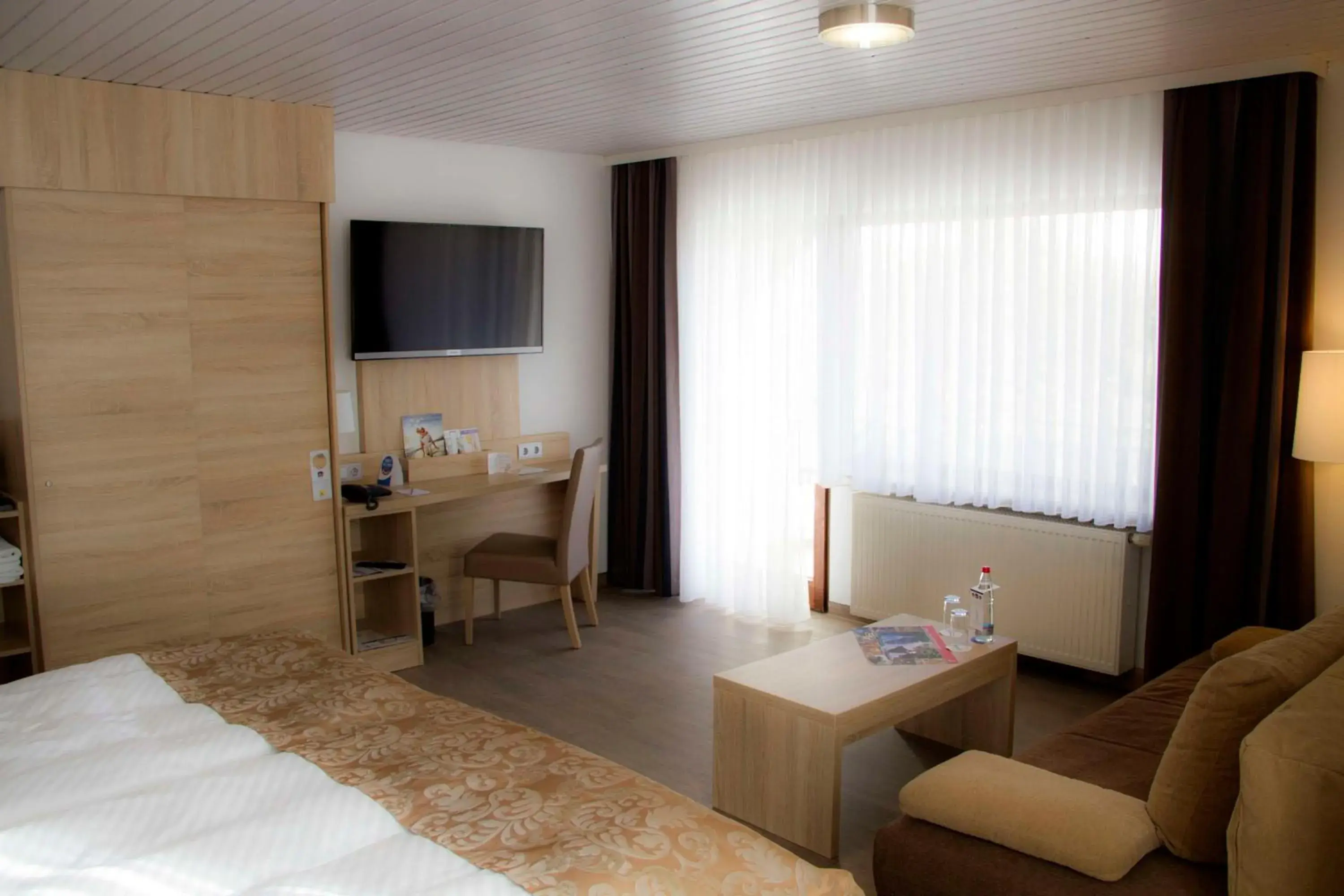 Bedroom, Bed in Best Western Plus Schwarzwald Residenz Bedroom, Bed in Best Western Plus Schwarzwald Residenz