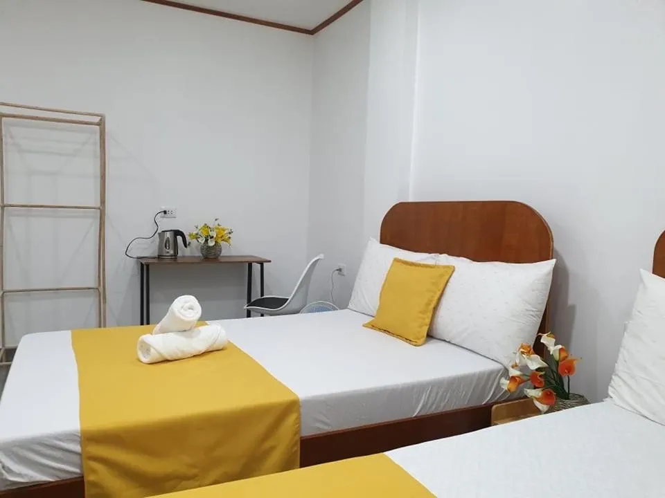 Photo of the whole room, Bed in Camiguin KALIMBA DE LUNA INN